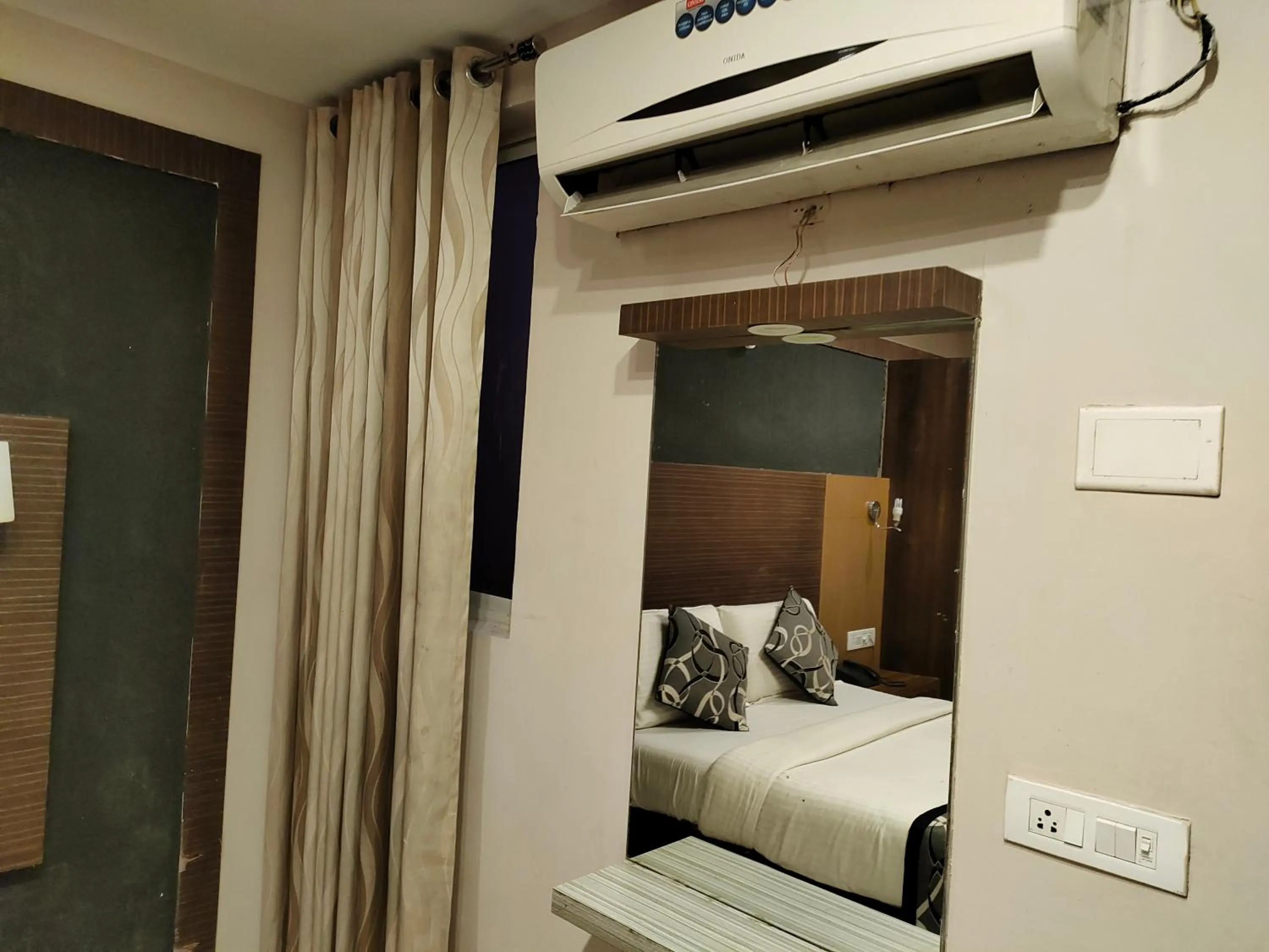 Photo of the whole room, Bed in Santhi Bhavan, Chennai Central