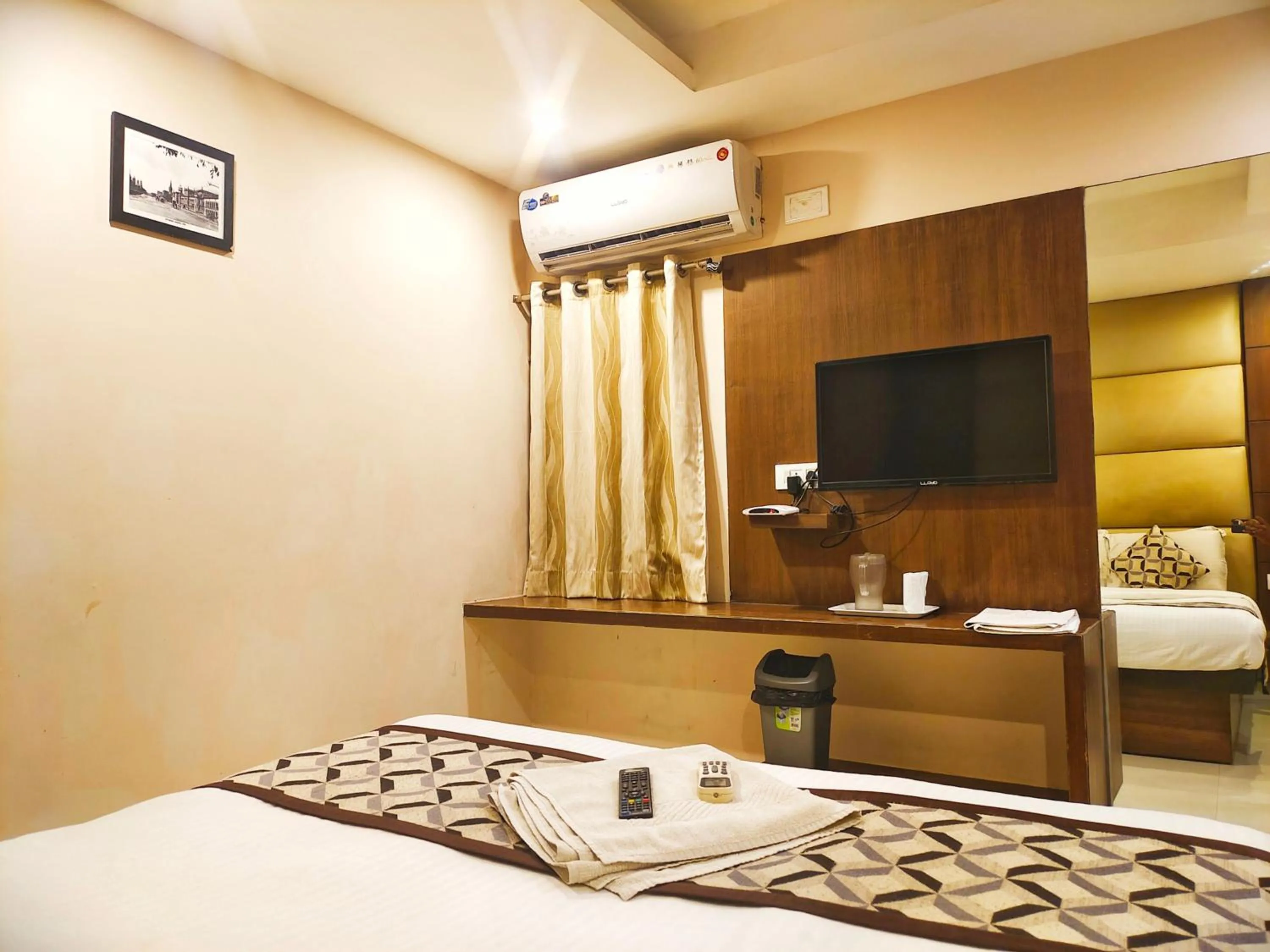 Photo of the whole room, Bed in Santhi Bhavan, Chennai Central