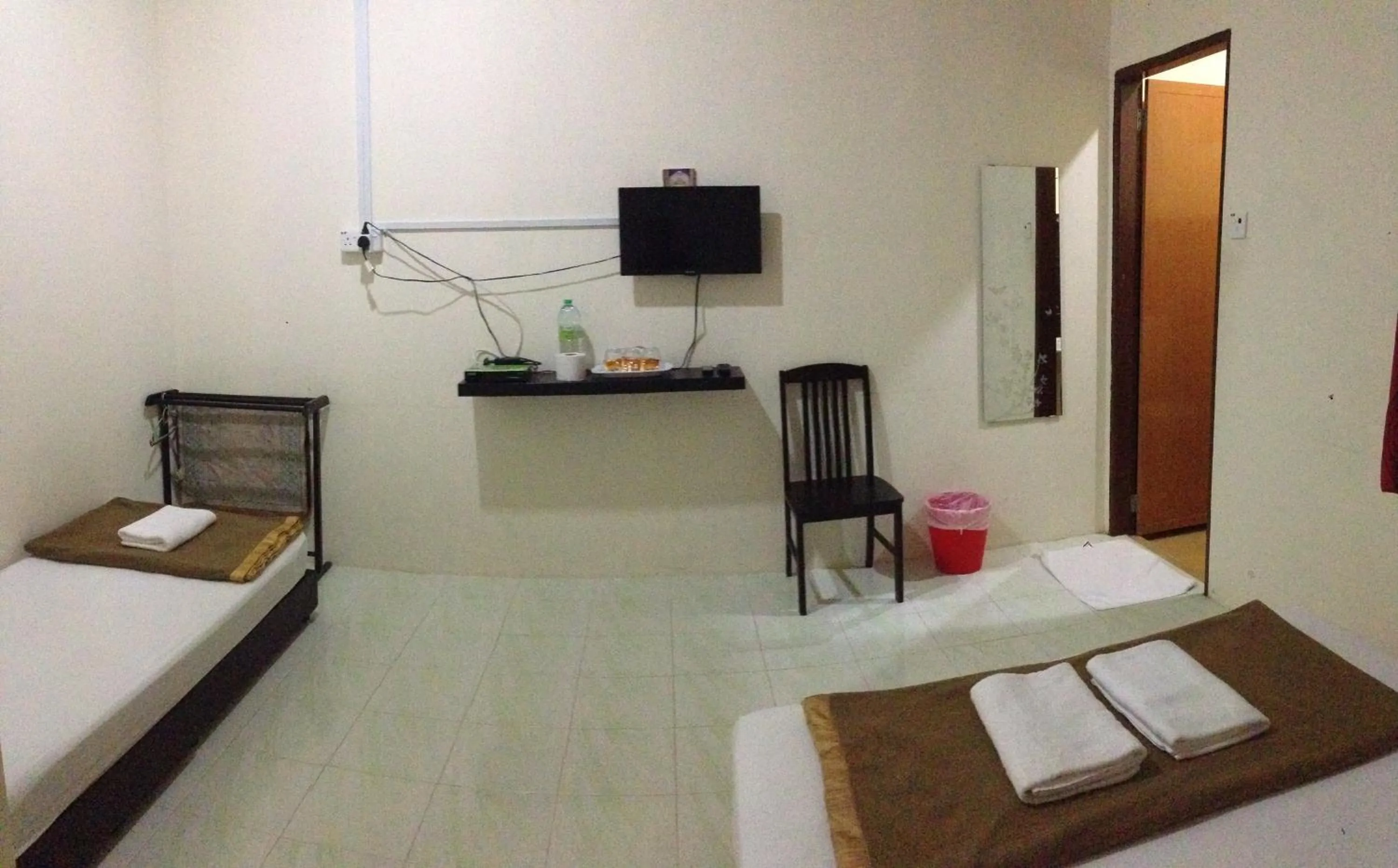 Shower, Bed in Semarak Beach Inn