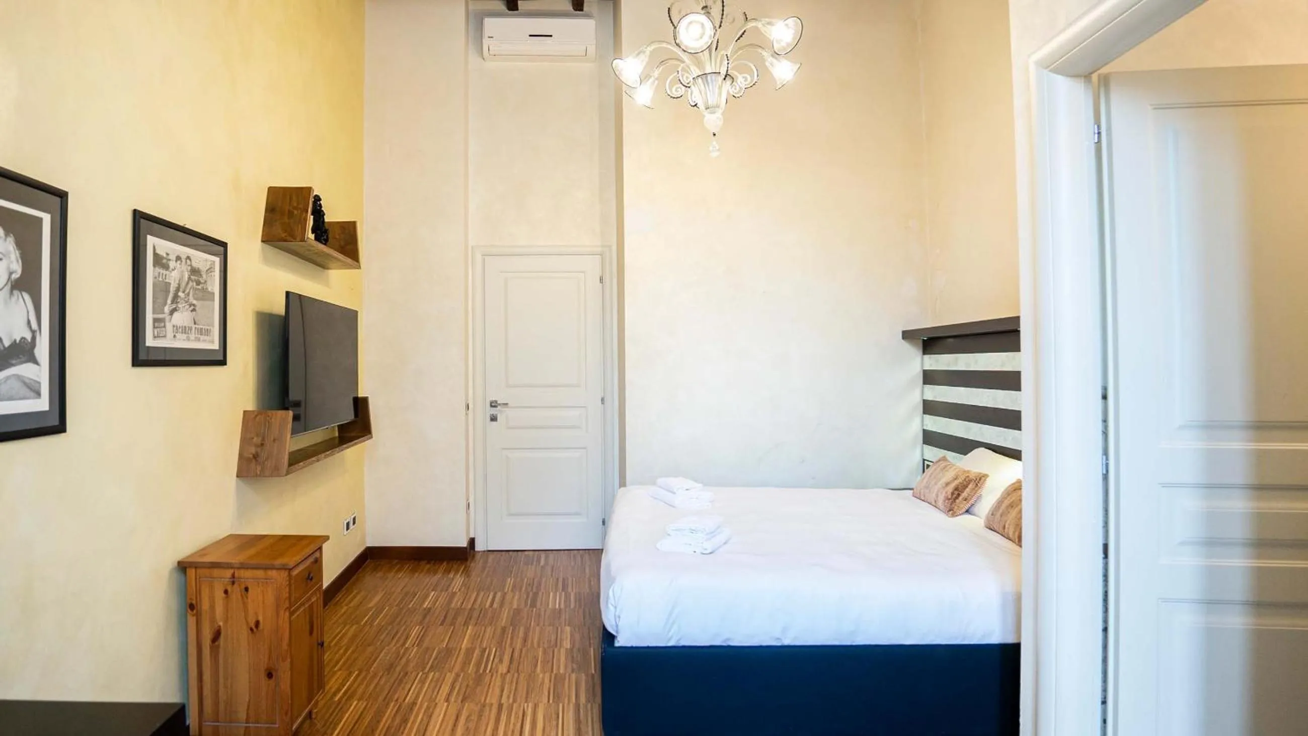 Bedroom, Bed in EasyTopStay - Piazza Venezia City View Charming Apt