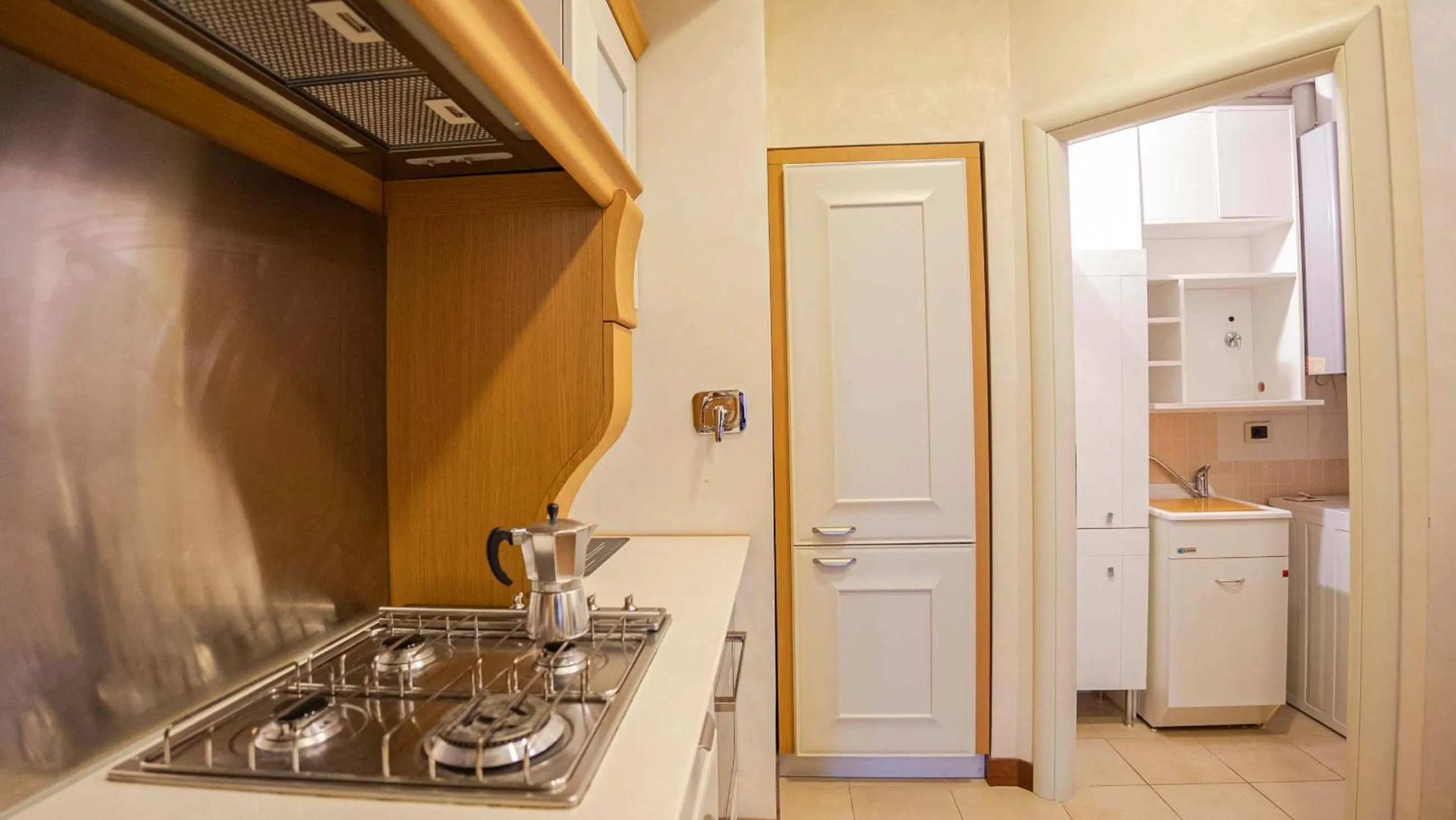 Kitchen or kitchenette in EasyTopStay - Piazza Venezia City View Charming Apt