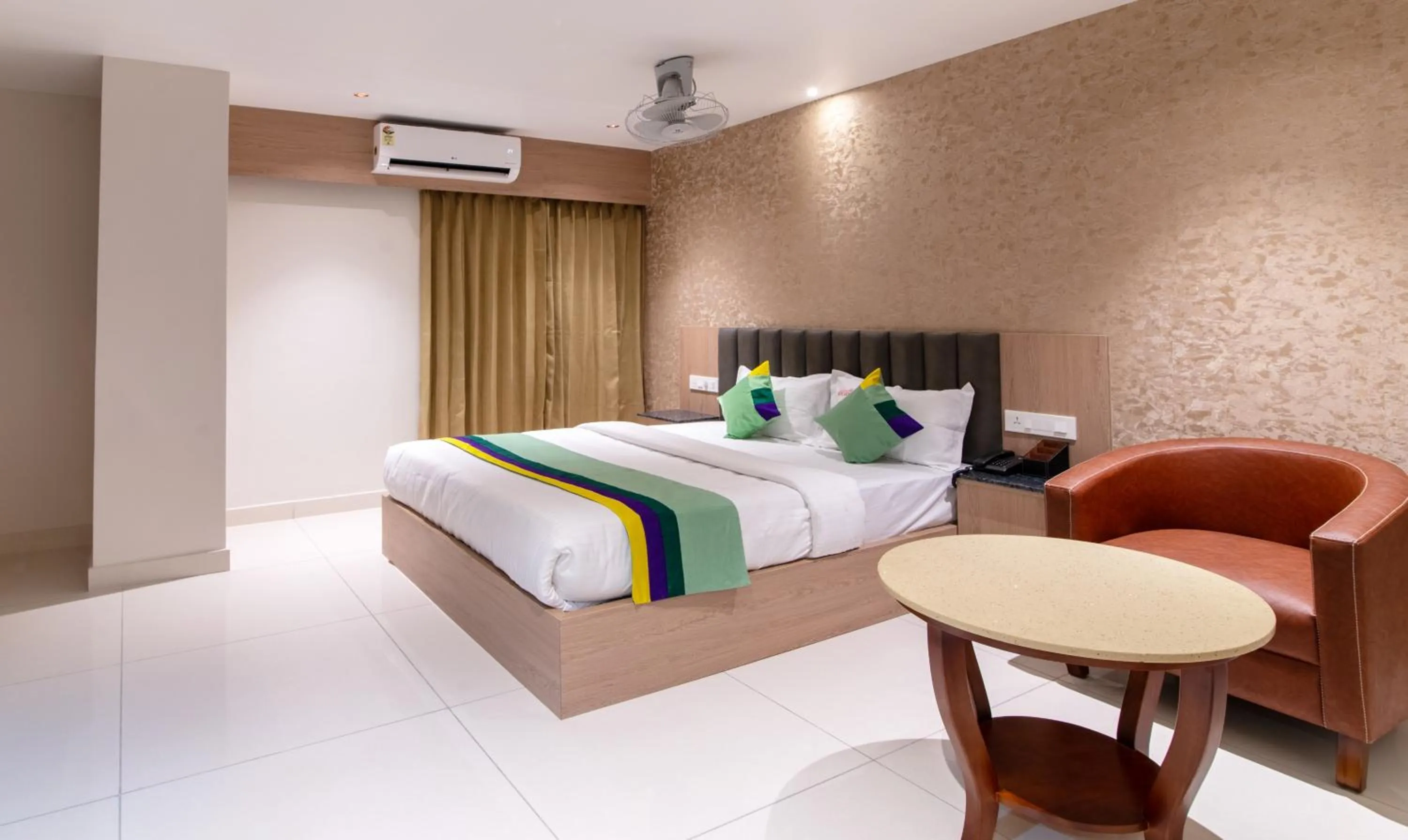 Bedroom, Bed in Treebo Premium New Light Suites