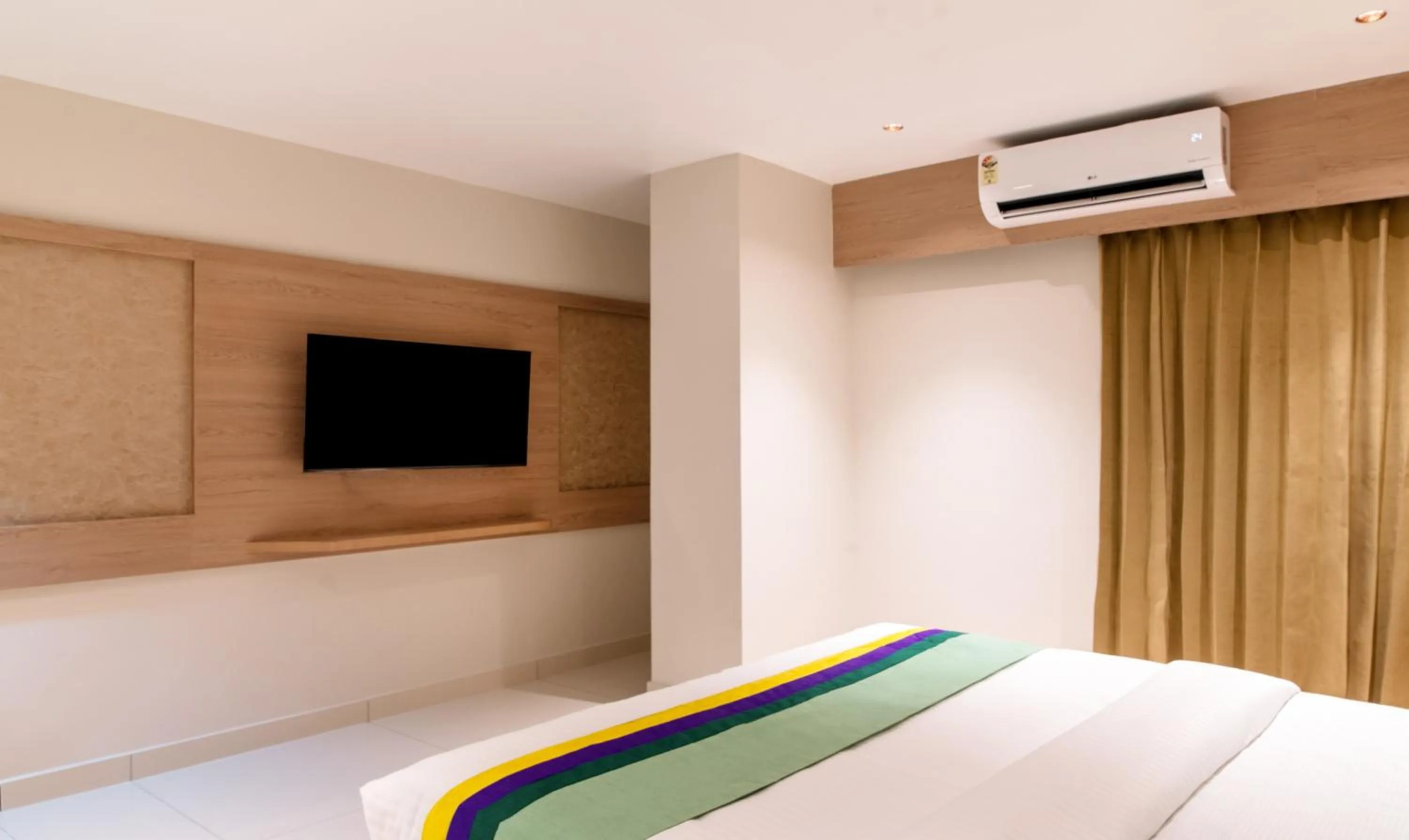 Bedroom, Bed in Treebo Premium New Light Suites