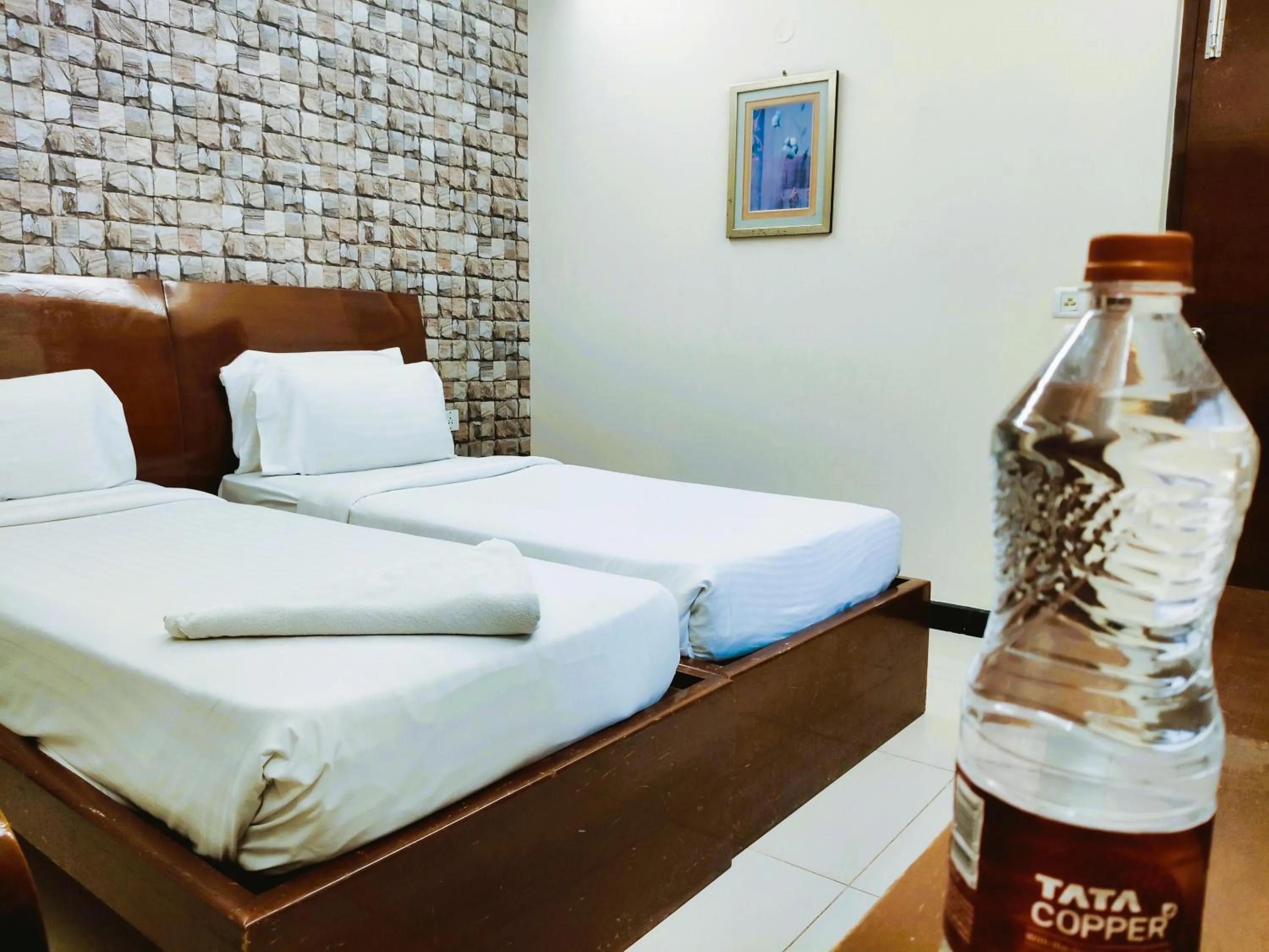 Bed in Athasri Hotel Infantry Road