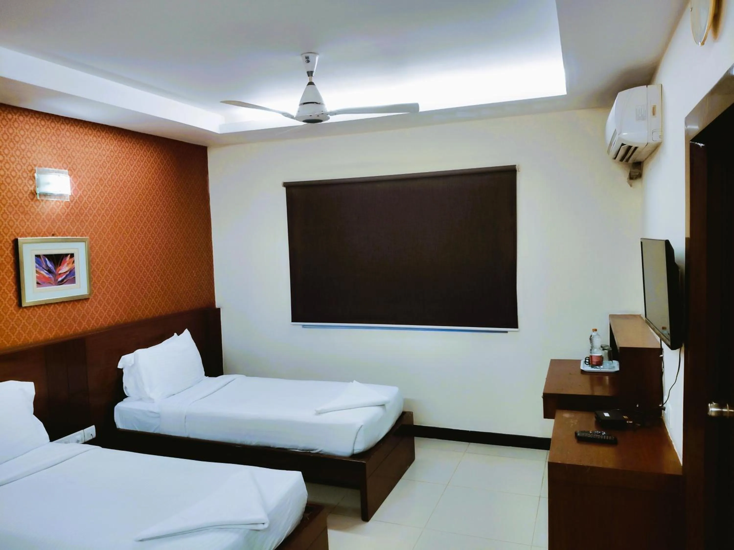 Bed in Athasri Hotel Infantry Road