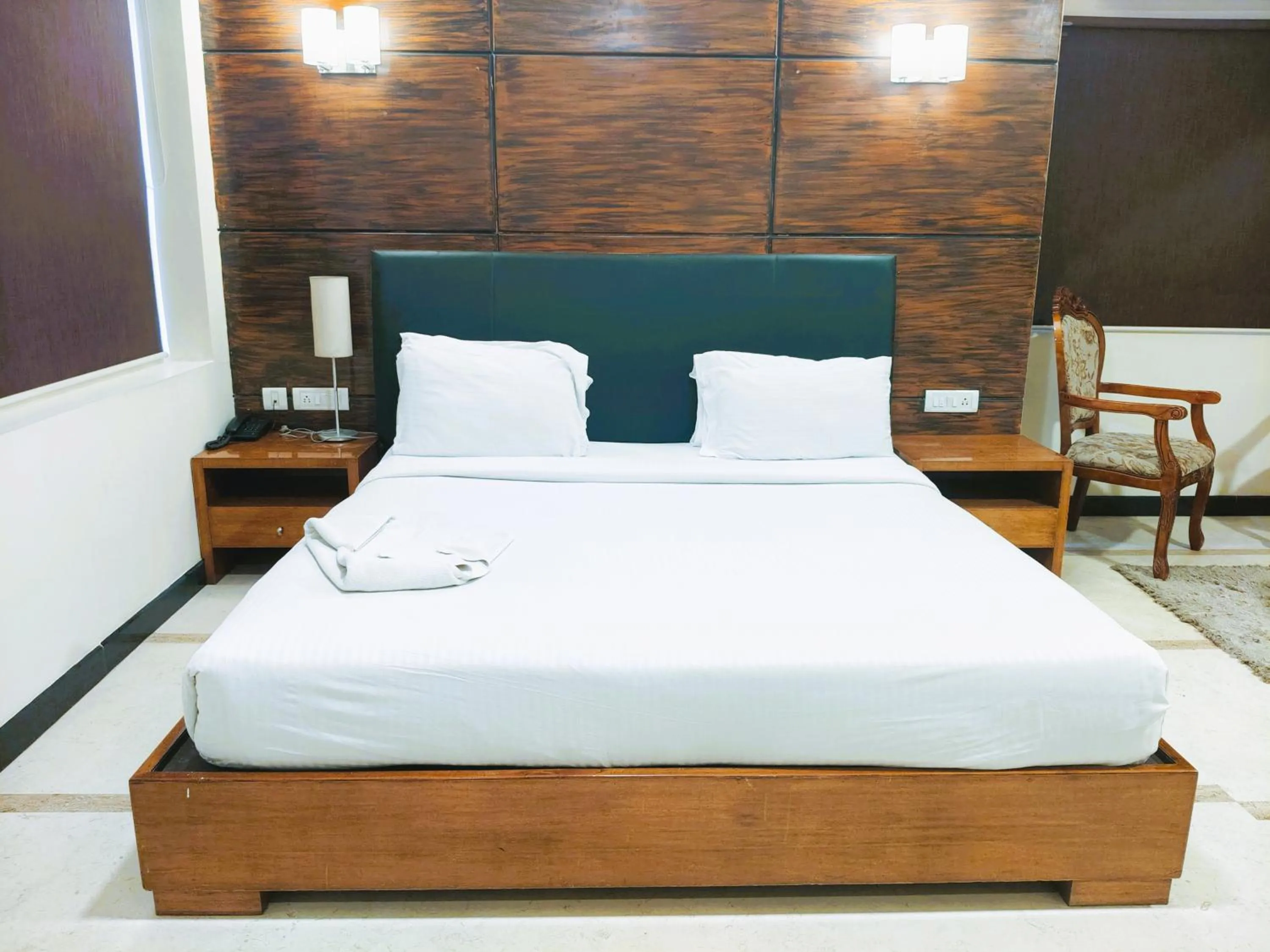 Bed in Athasri Hotel Infantry Road