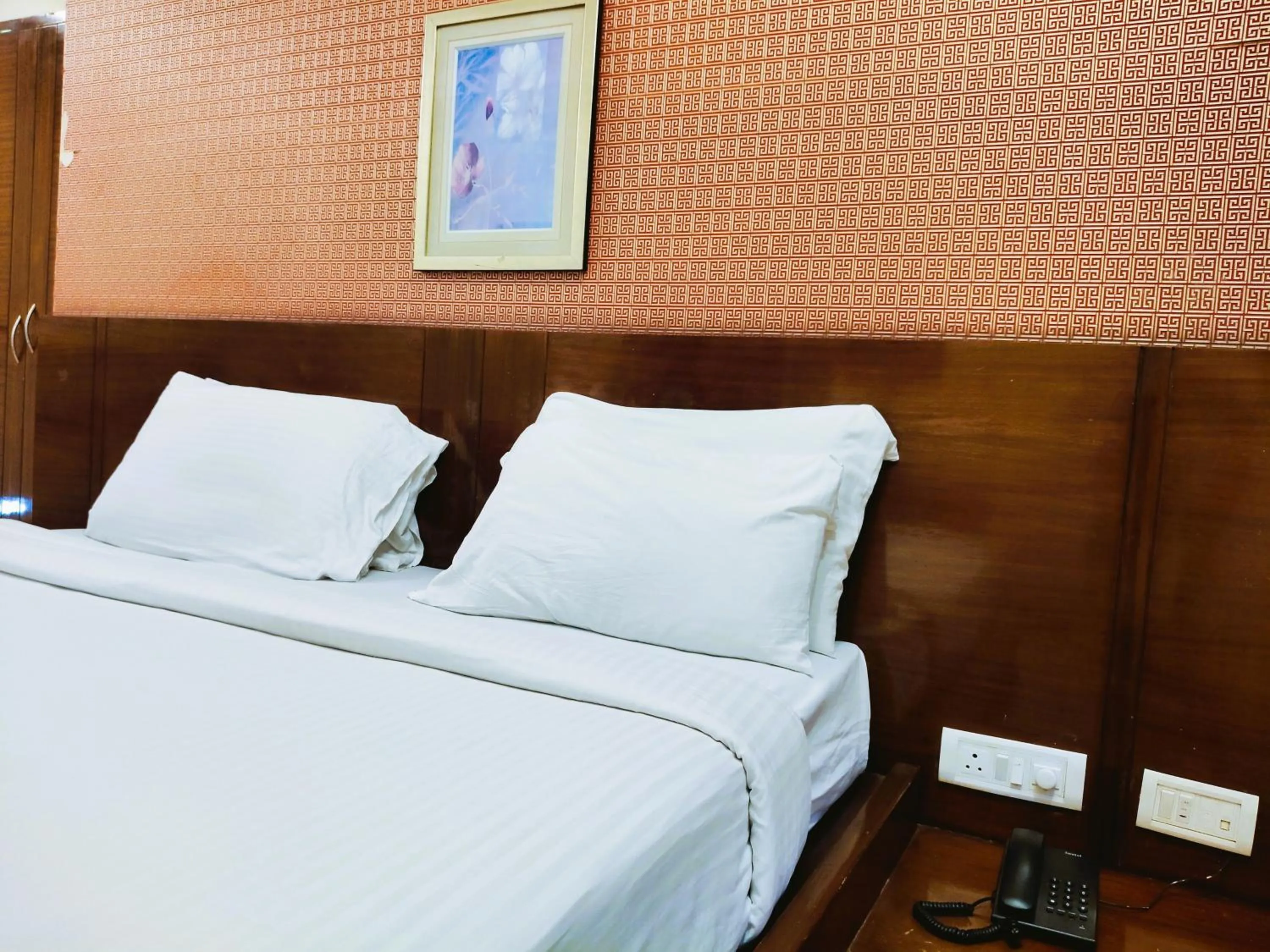 Bed in Athasri Hotel Infantry Road