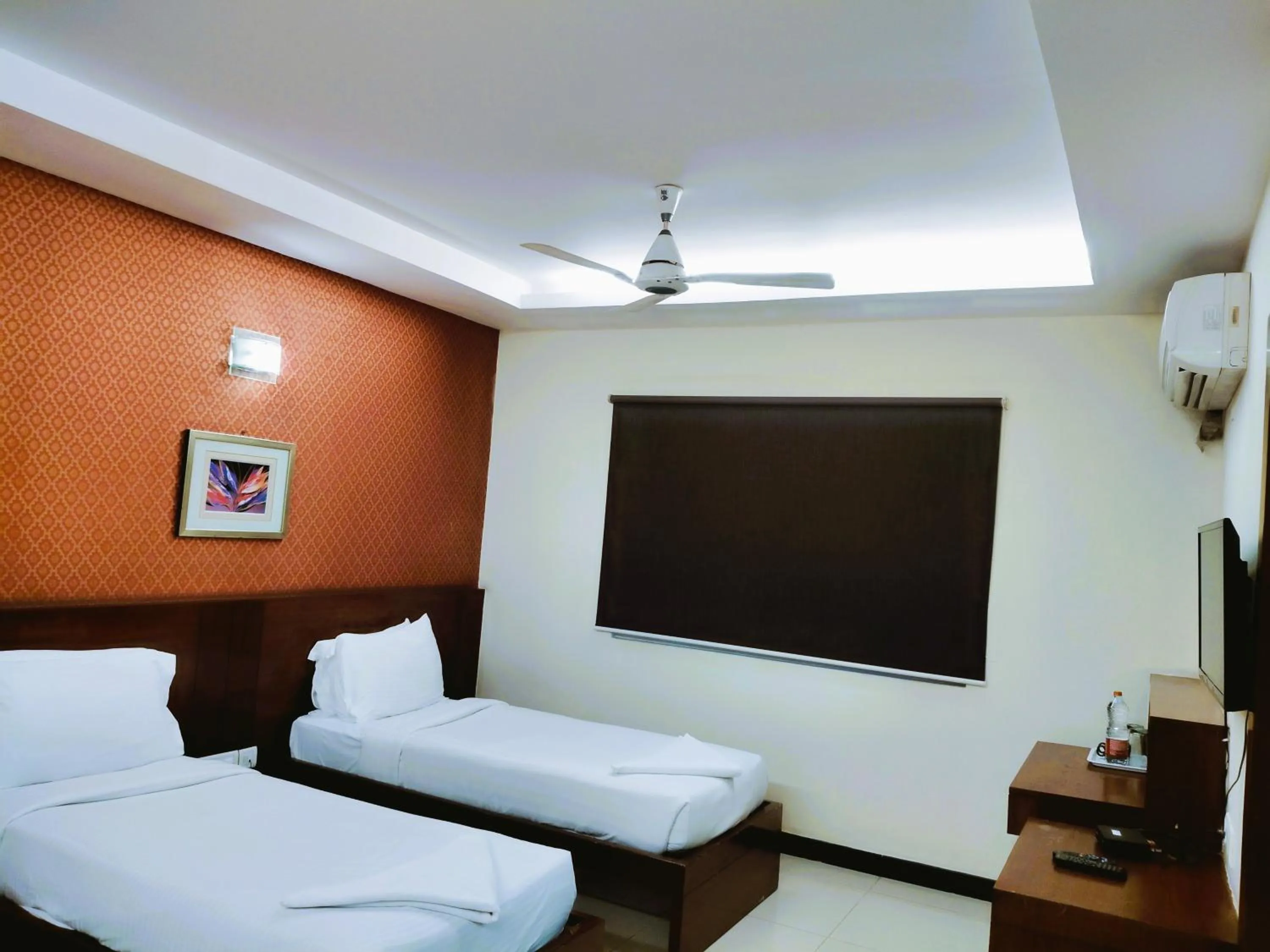 Bed in Athasri Hotel Infantry Road