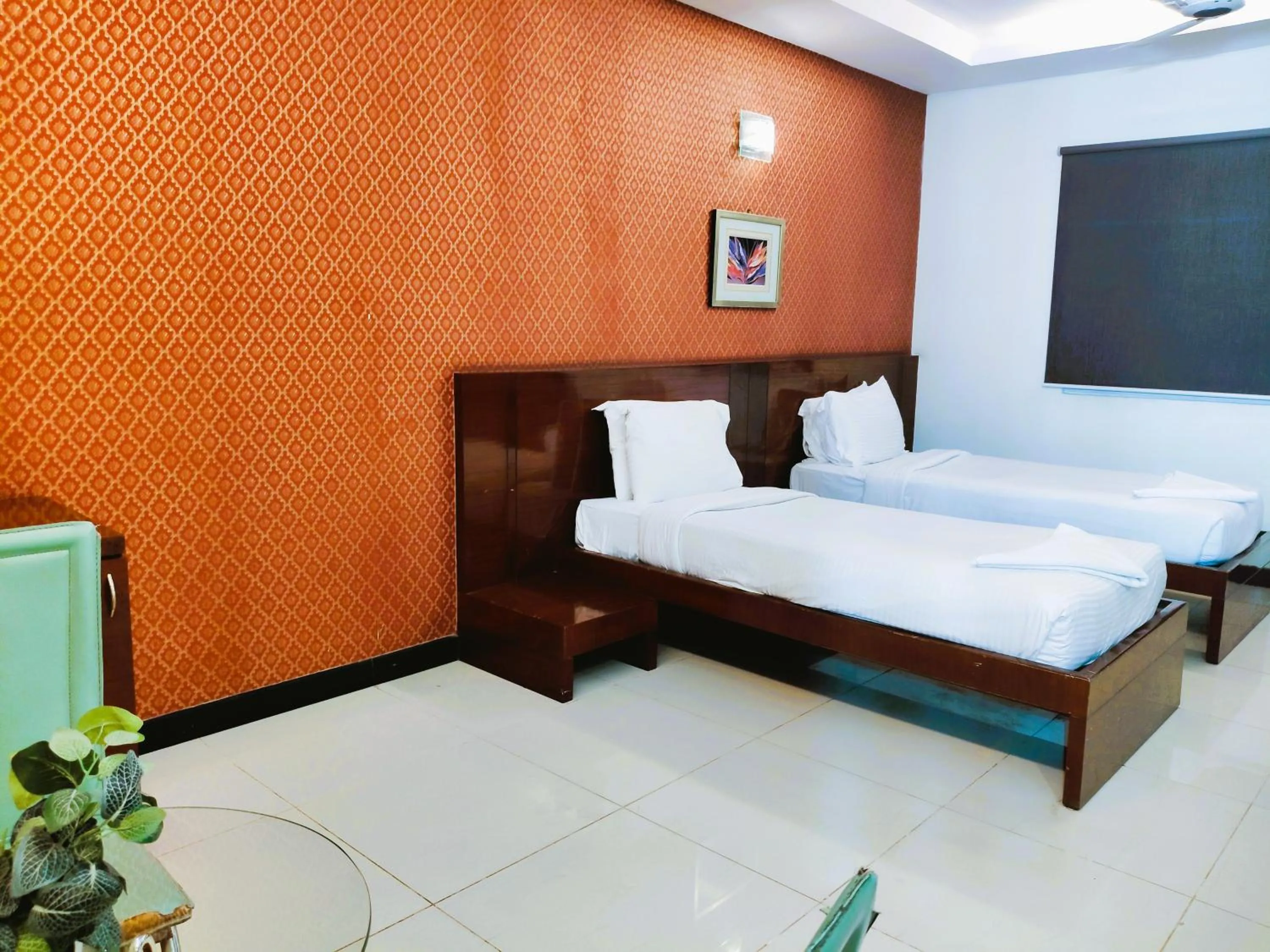 Bed in Athasri Hotel Infantry Road