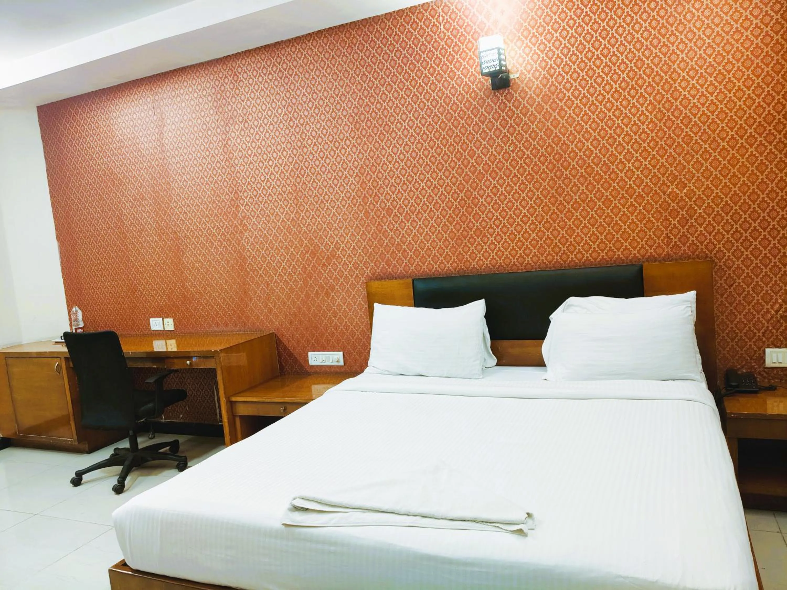 Bed in Athasri Hotel Infantry Road