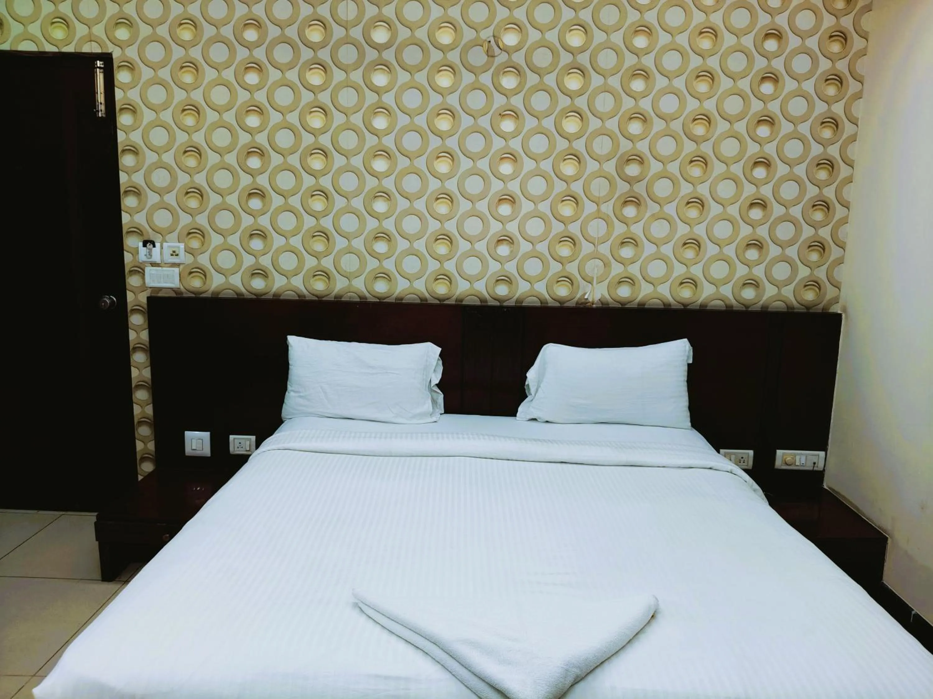 Bed in Athasri Hotel Infantry Road