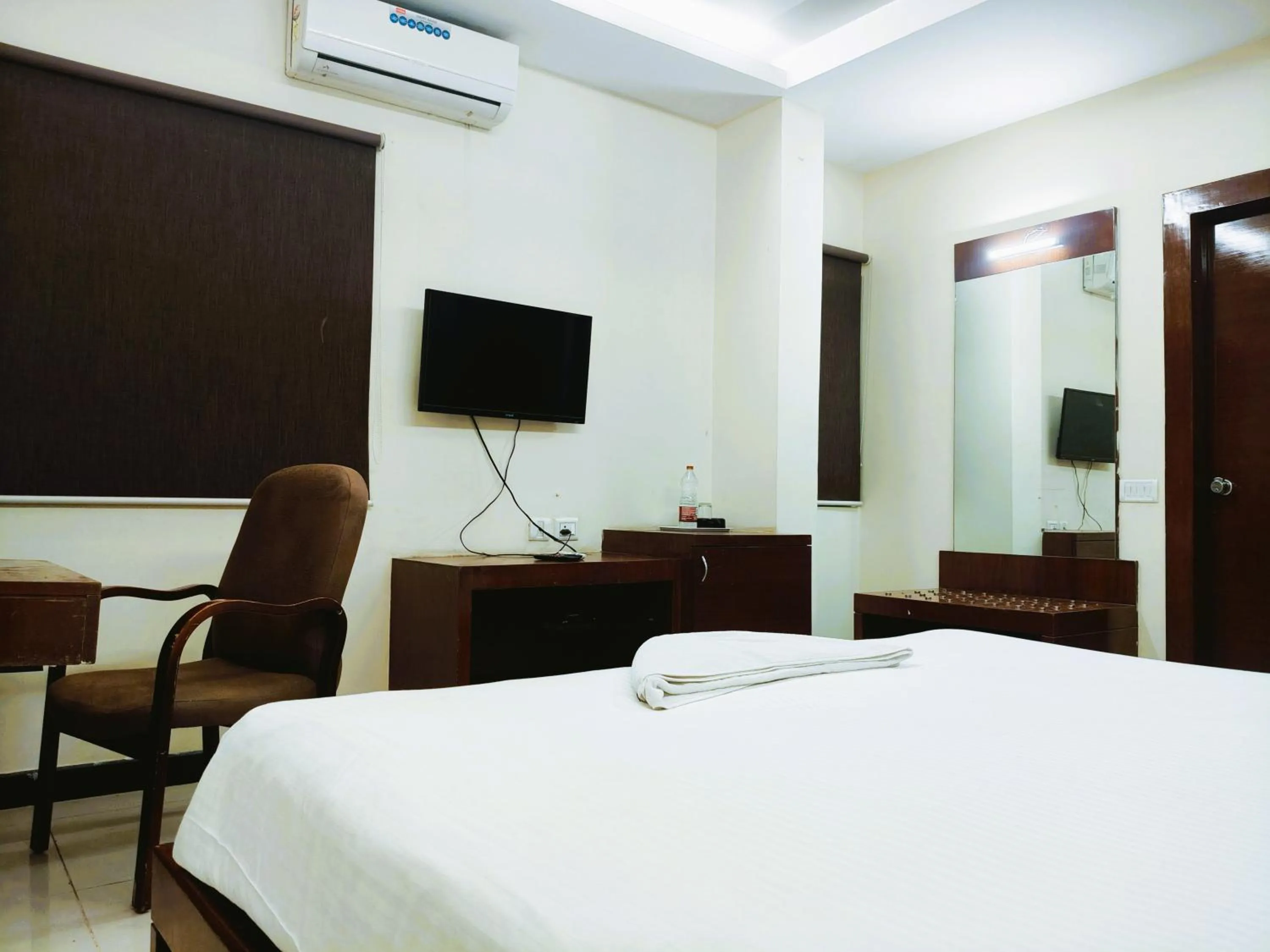 Bed in Athasri Hotel Infantry Road