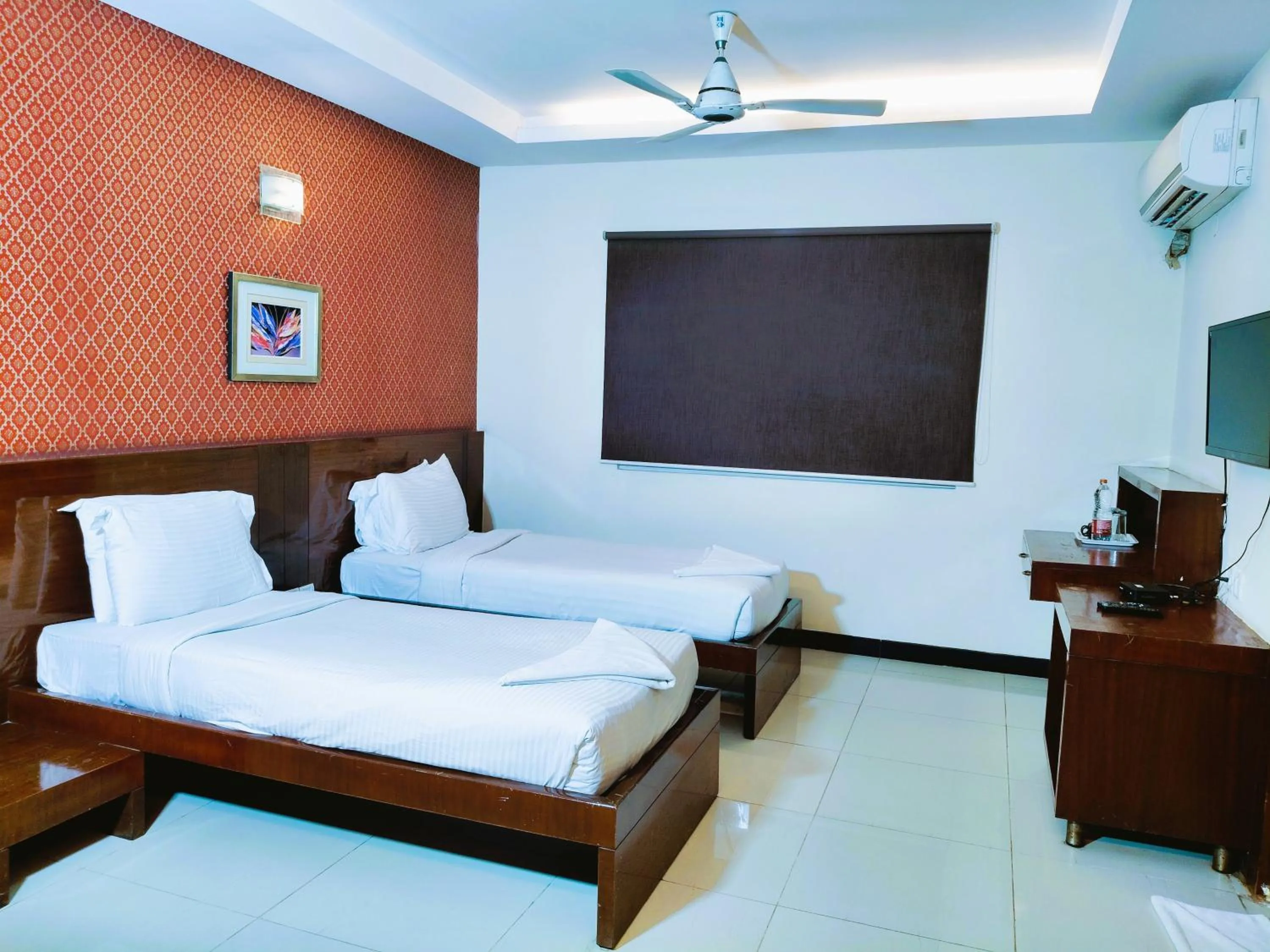 Bed in Athasri Hotel Infantry Road