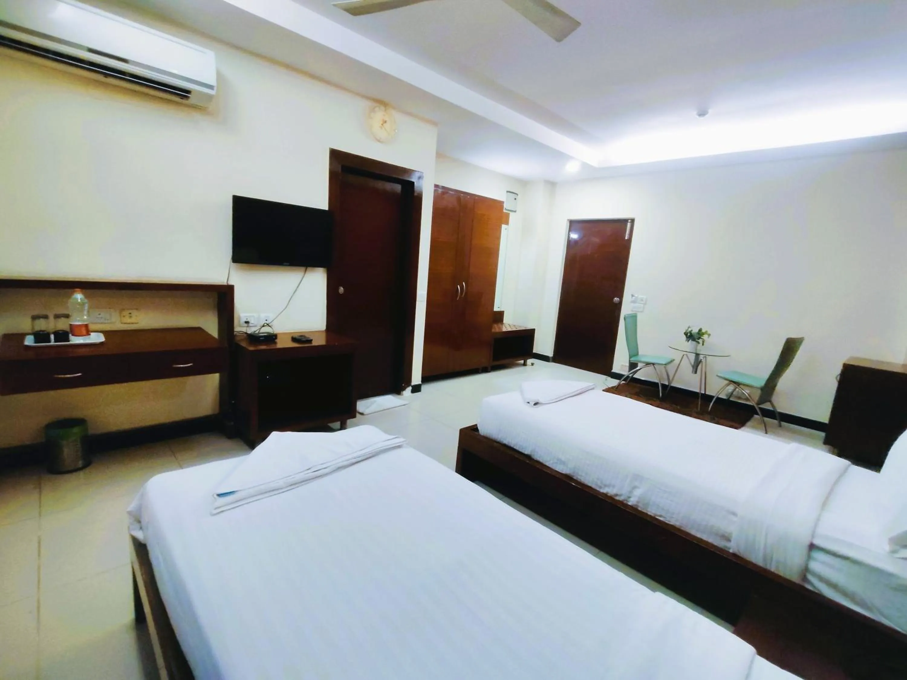 Bed in Athasri Hotel Infantry Road