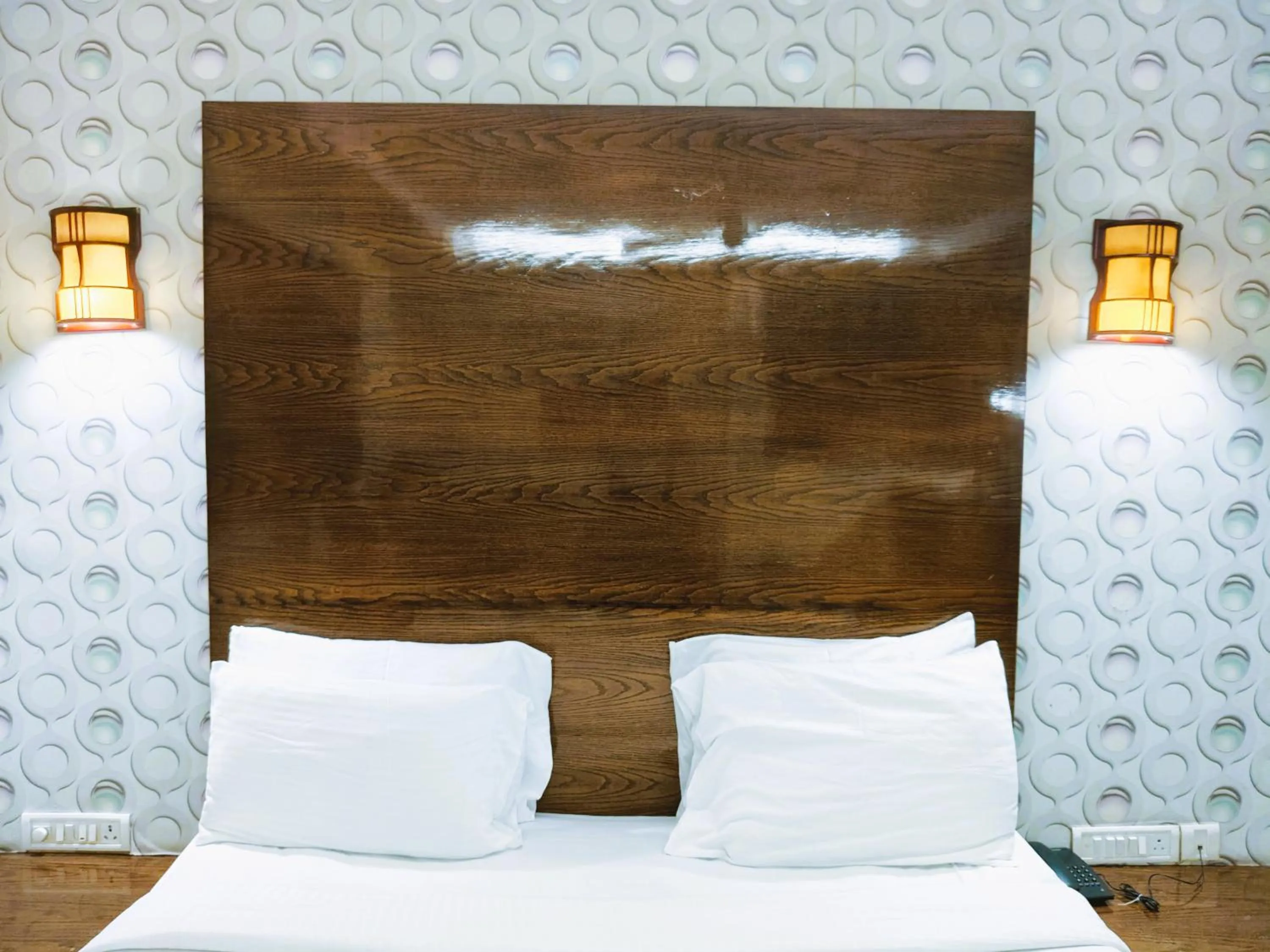 Bed in Athasri Hotel Infantry Road