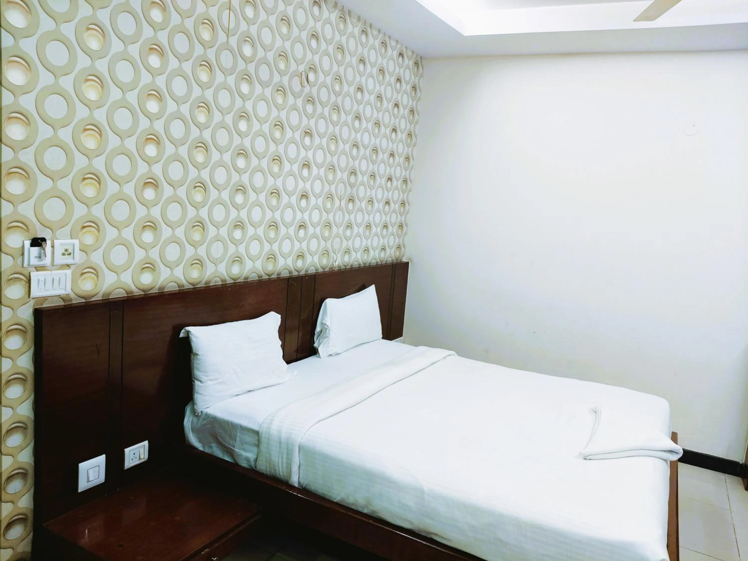 Bed in Athasri Hotel Infantry Road