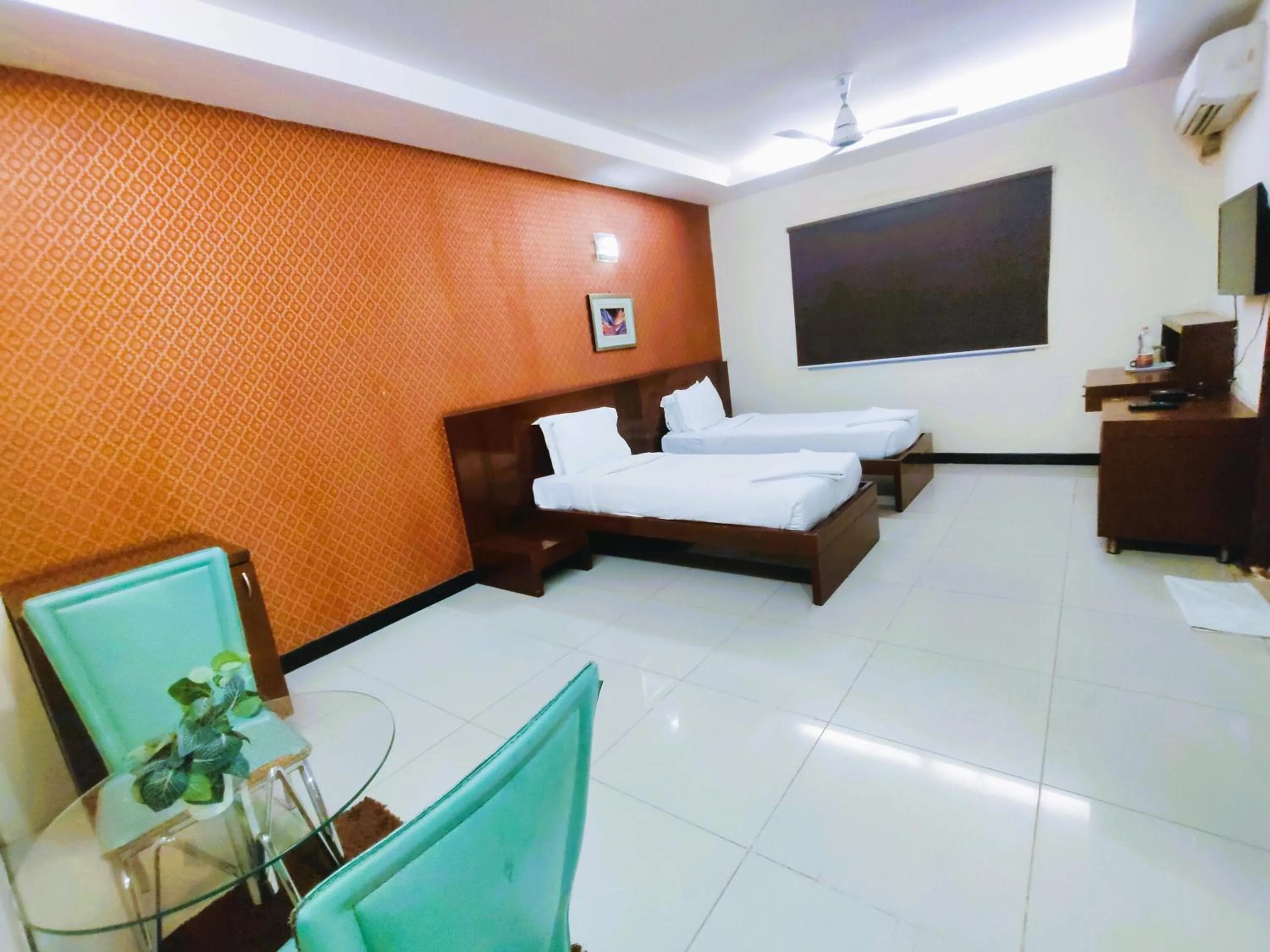 Bed in Athasri Hotel Infantry Road