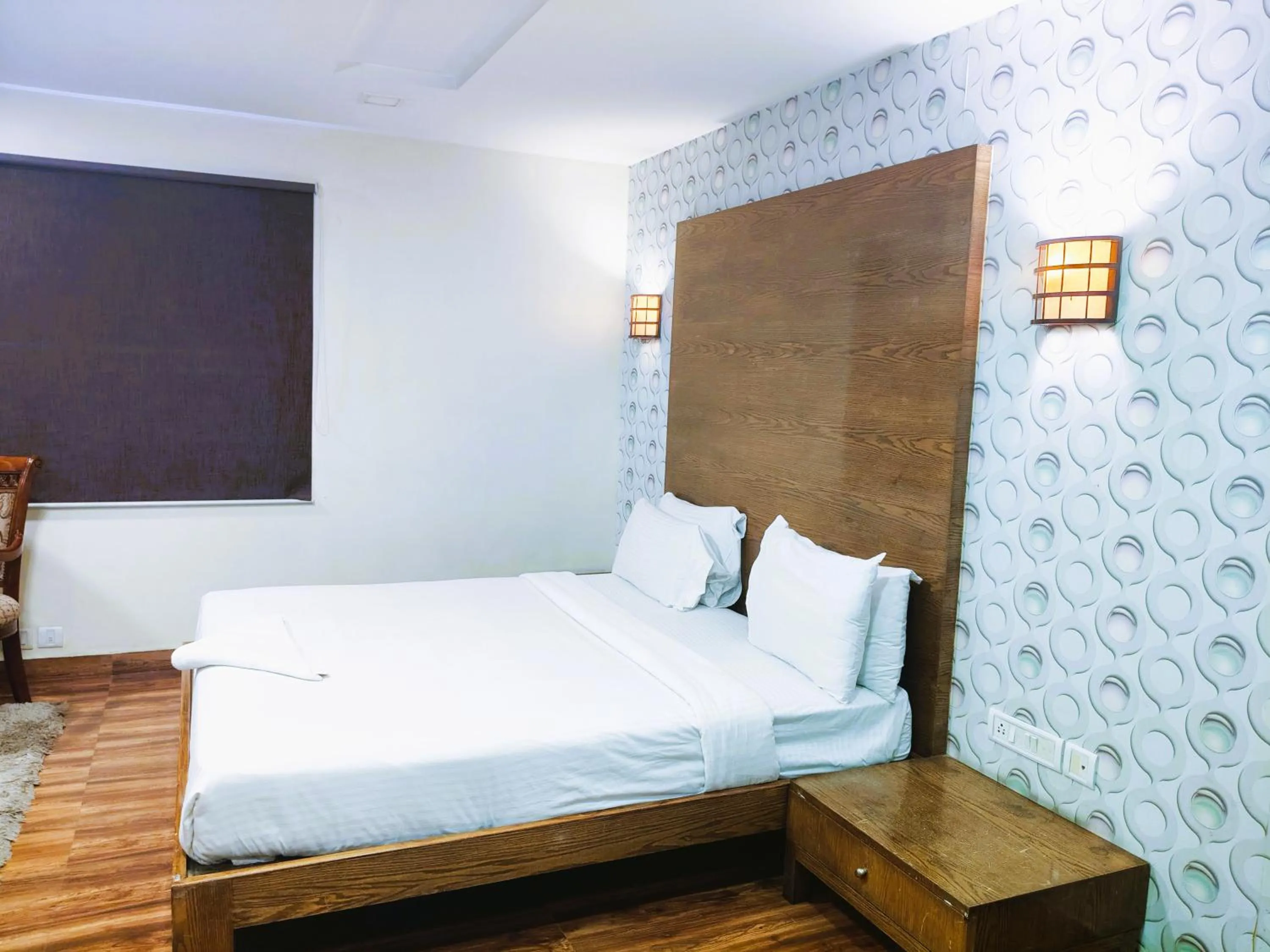 Bed in Athasri Hotel Infantry Road