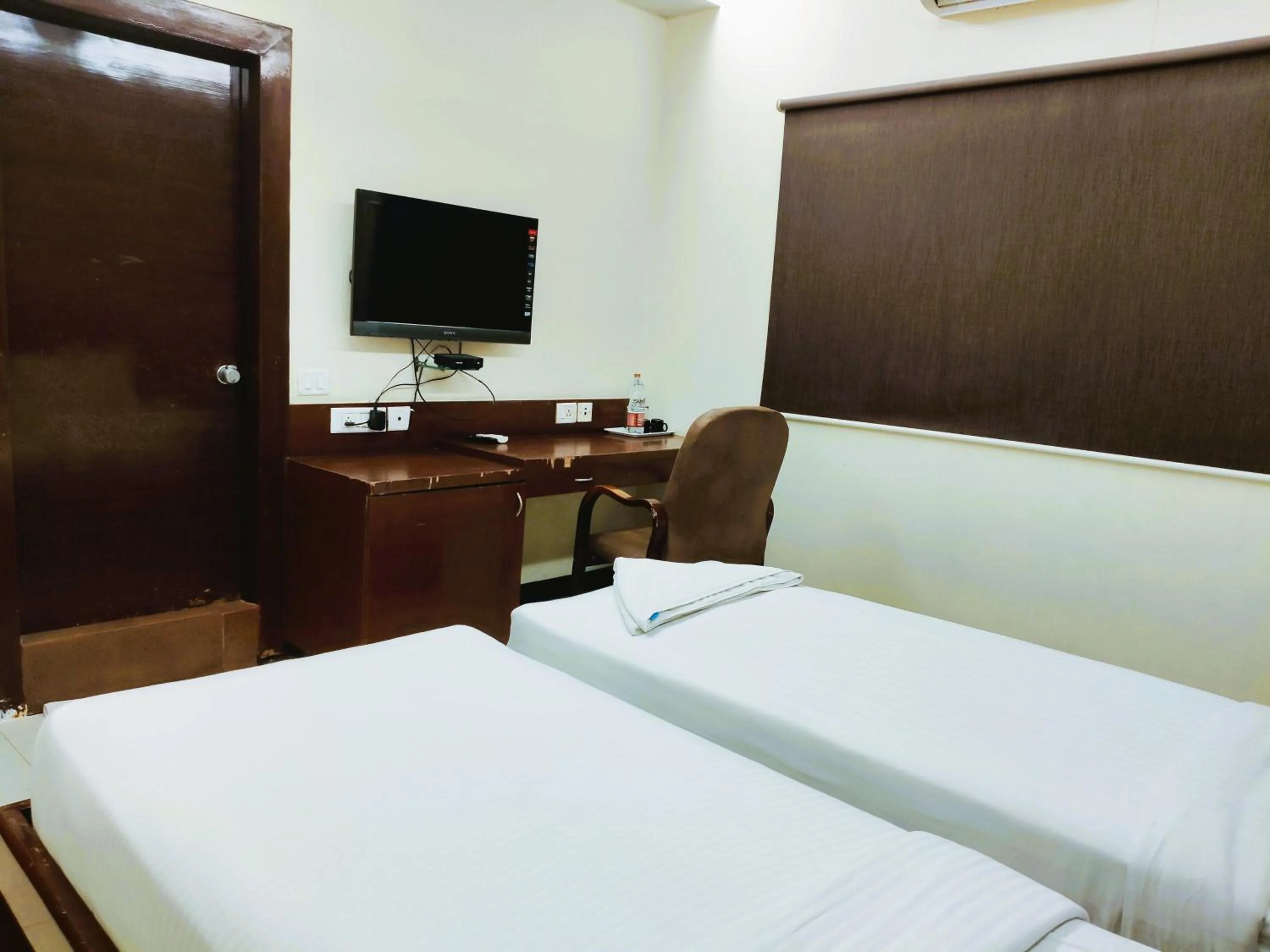 Bed in Athasri Hotel Infantry Road