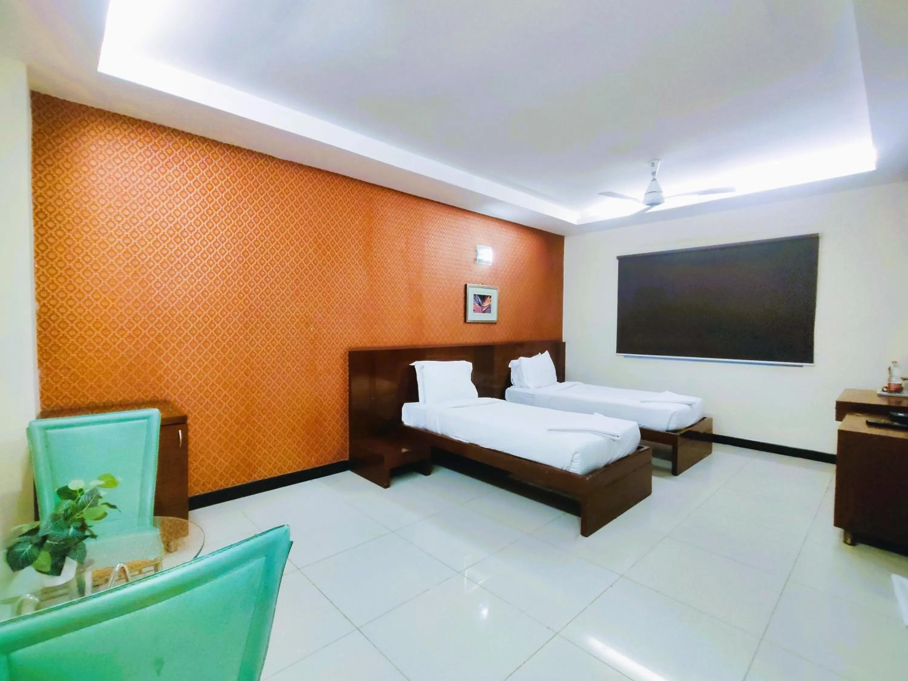 Bed in Athasri Hotel Infantry Road