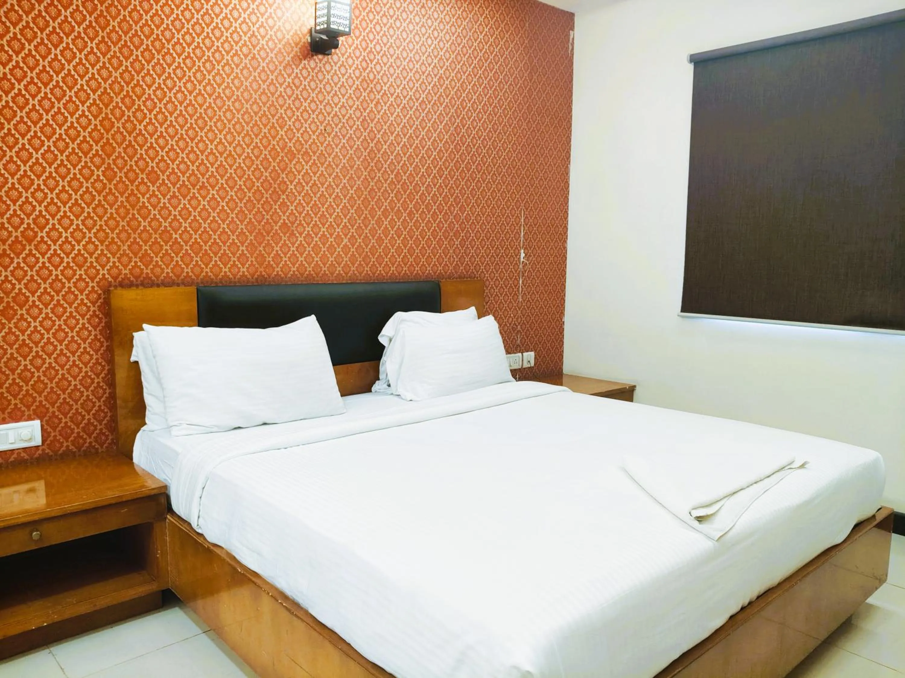 Bed in Athasri Hotel Infantry Road