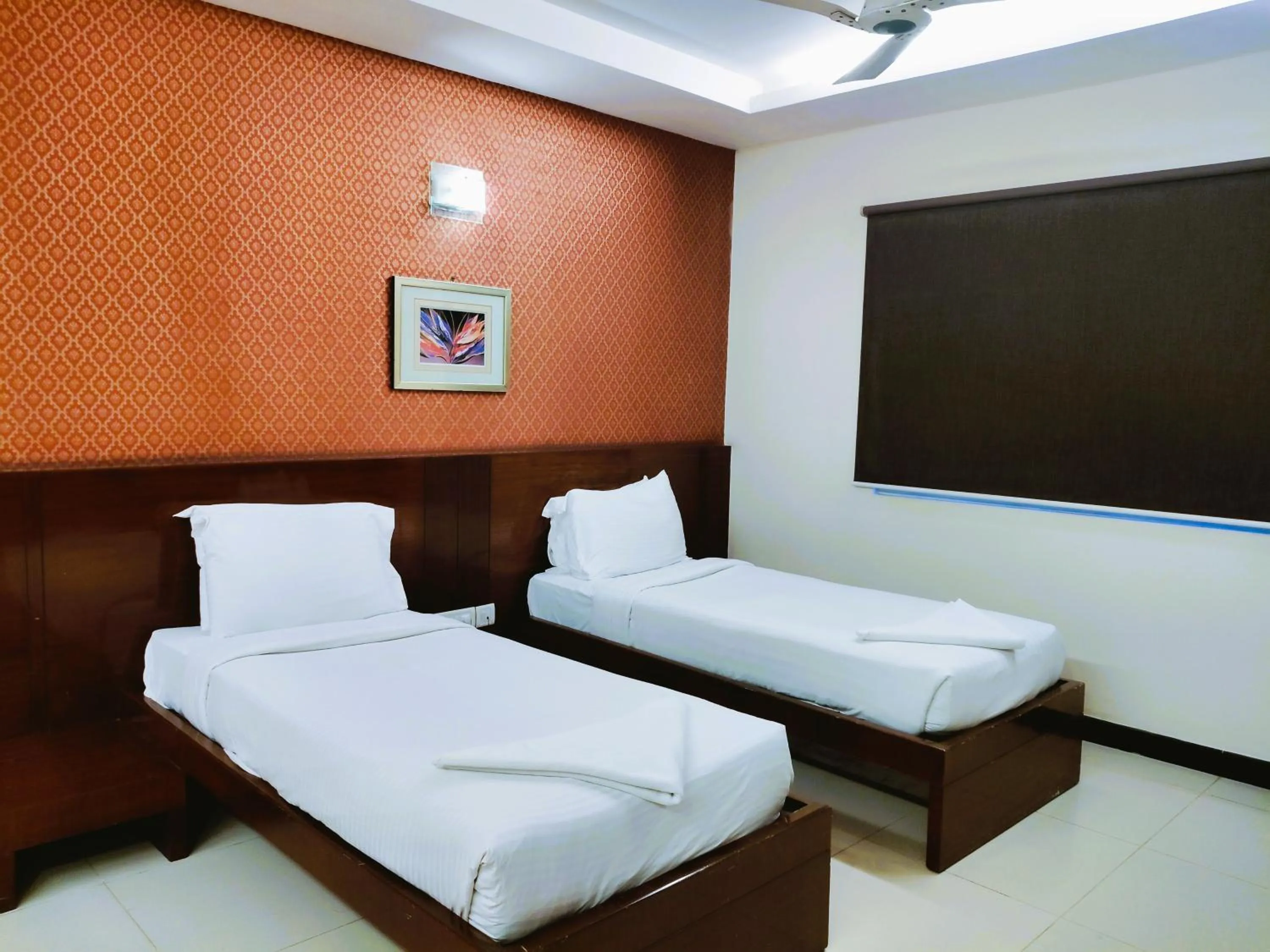Bed in Athasri Hotel Infantry Road