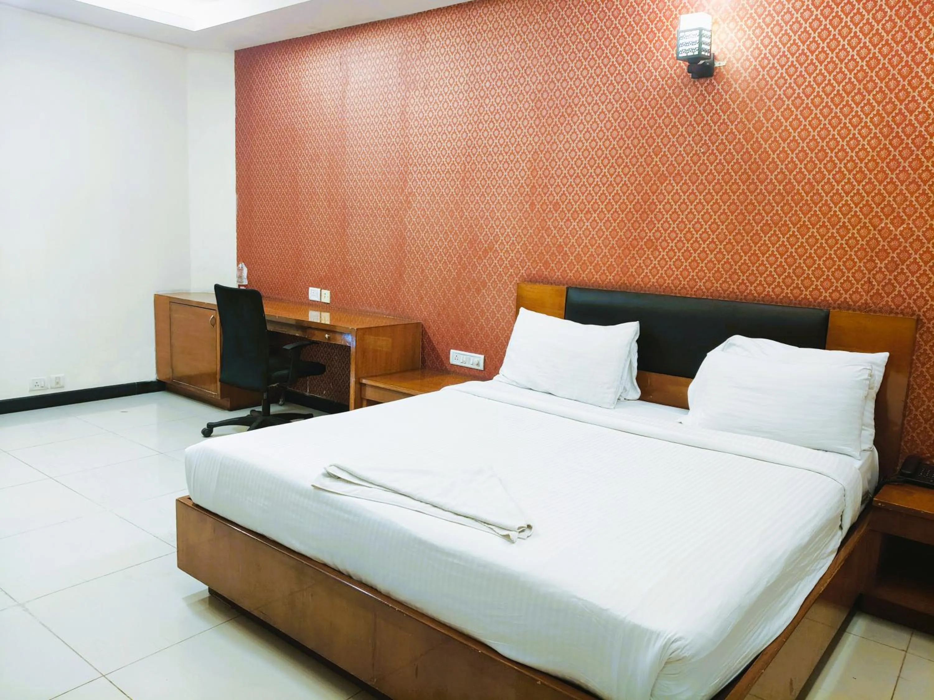 Bed in Athasri Hotel Infantry Road