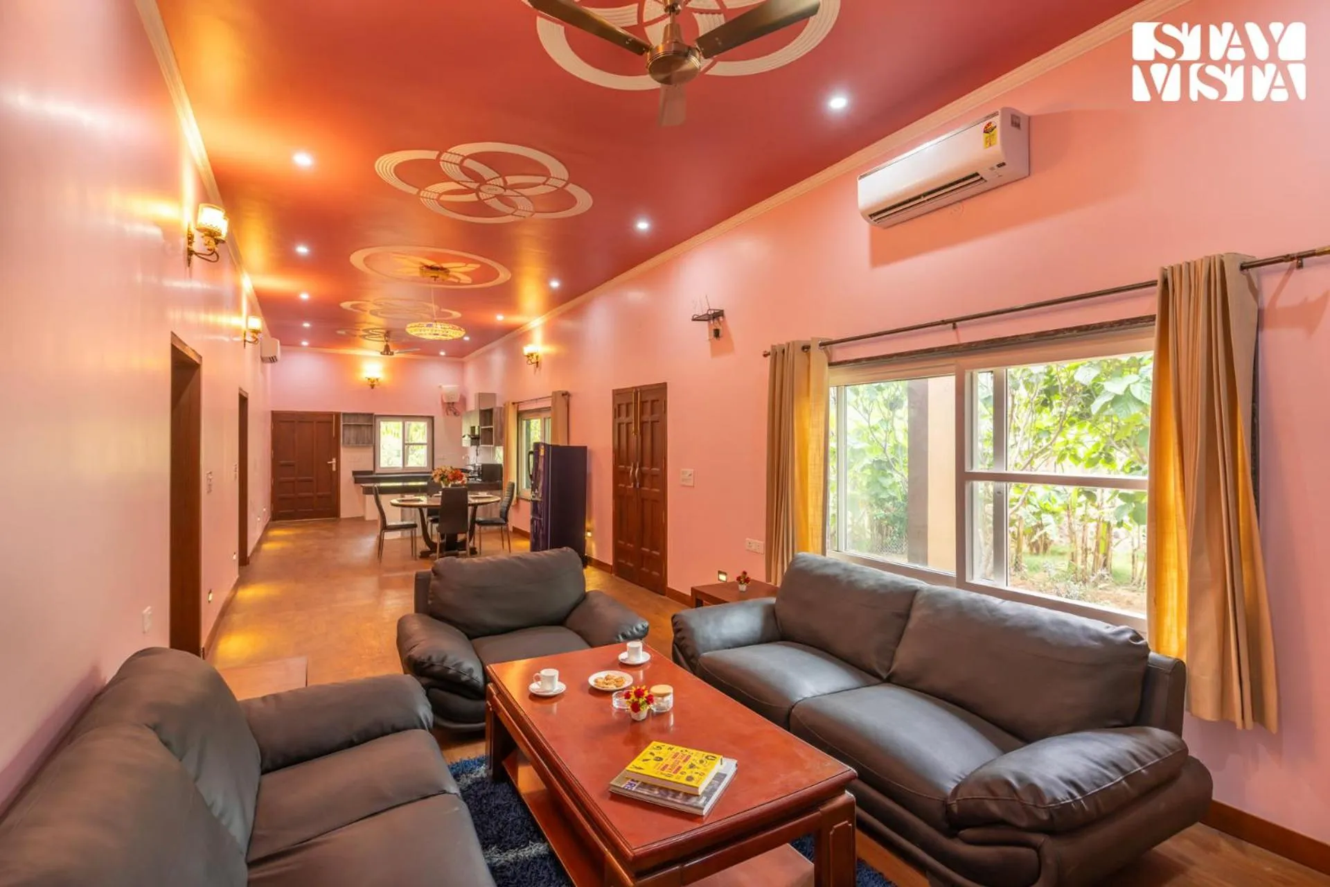 Living room in StayVista at Maple Farms with Pool, BBQ & Bonfire