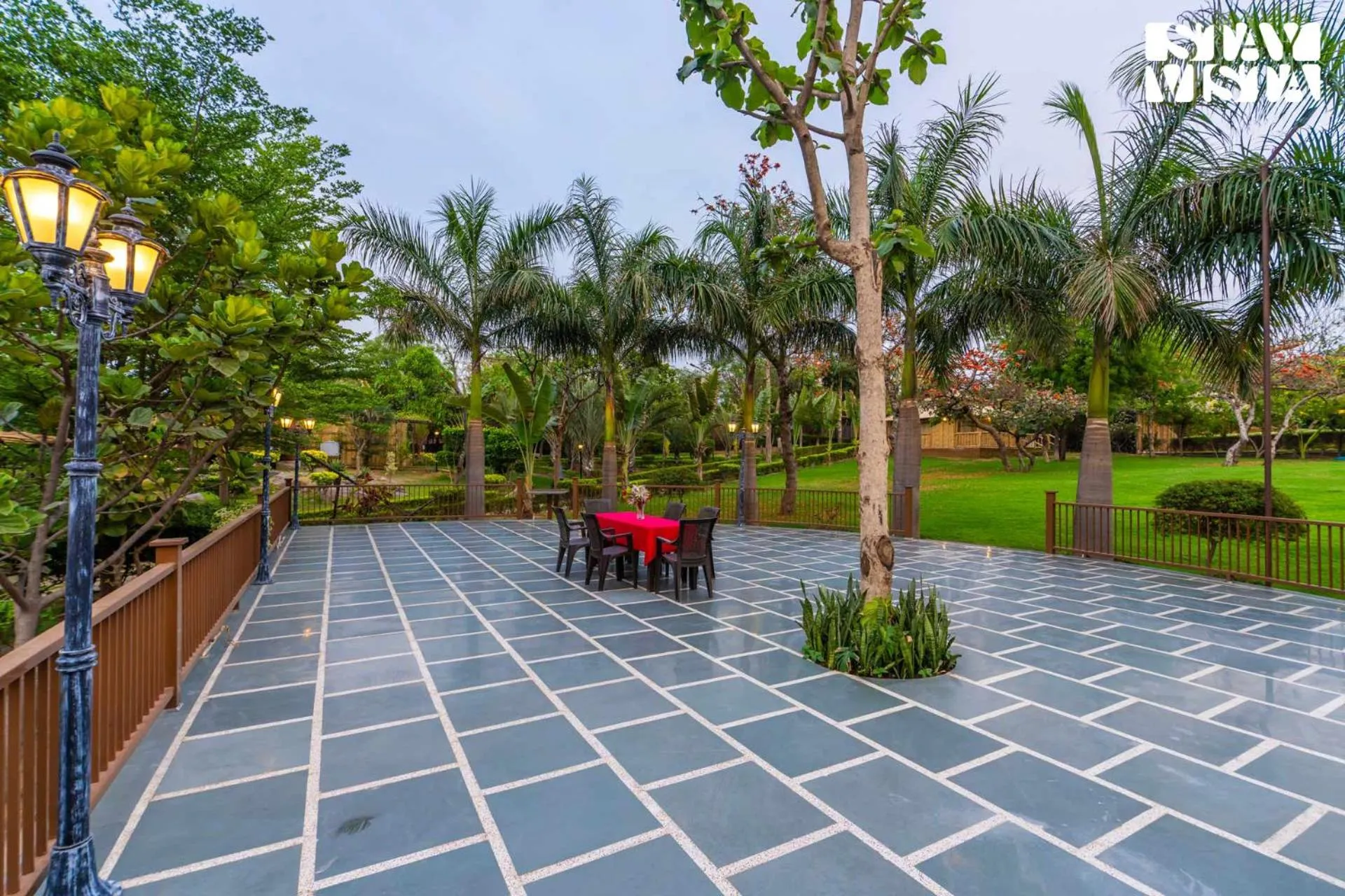 Seating area in StayVista at Maple Farms with Pool, BBQ & Bonfire