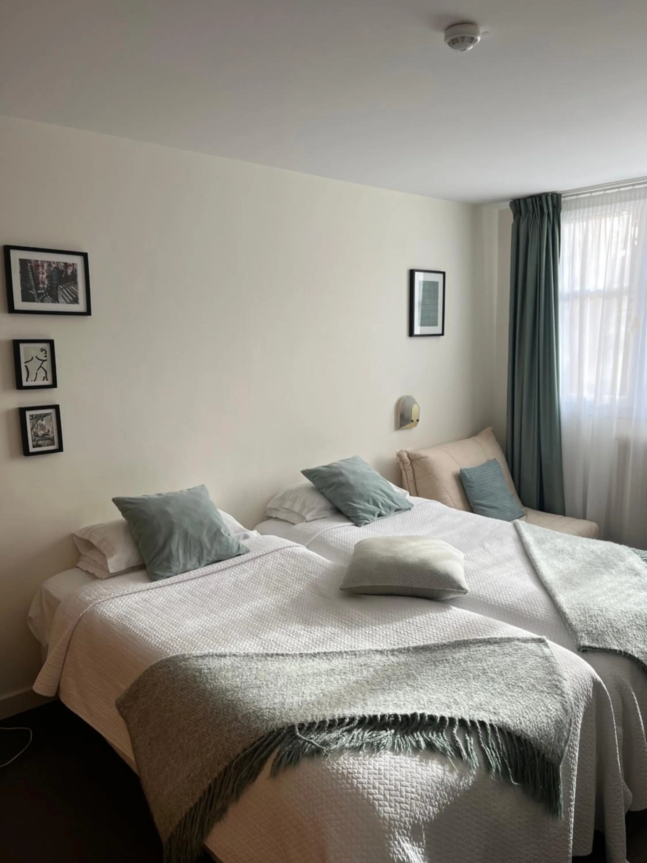 Bed in Le Téméraire Hôtel