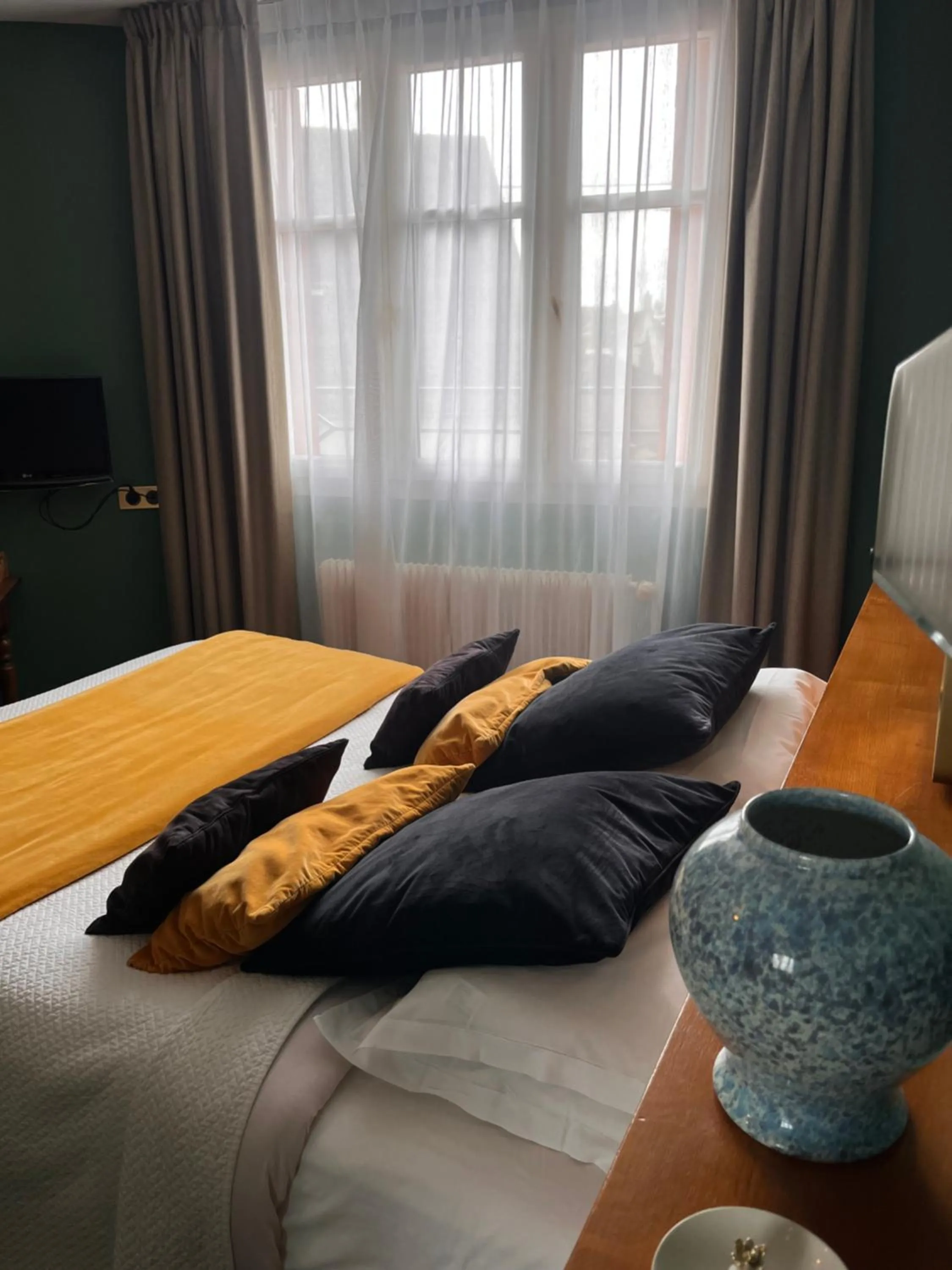 Bed in Le Téméraire Hôtel