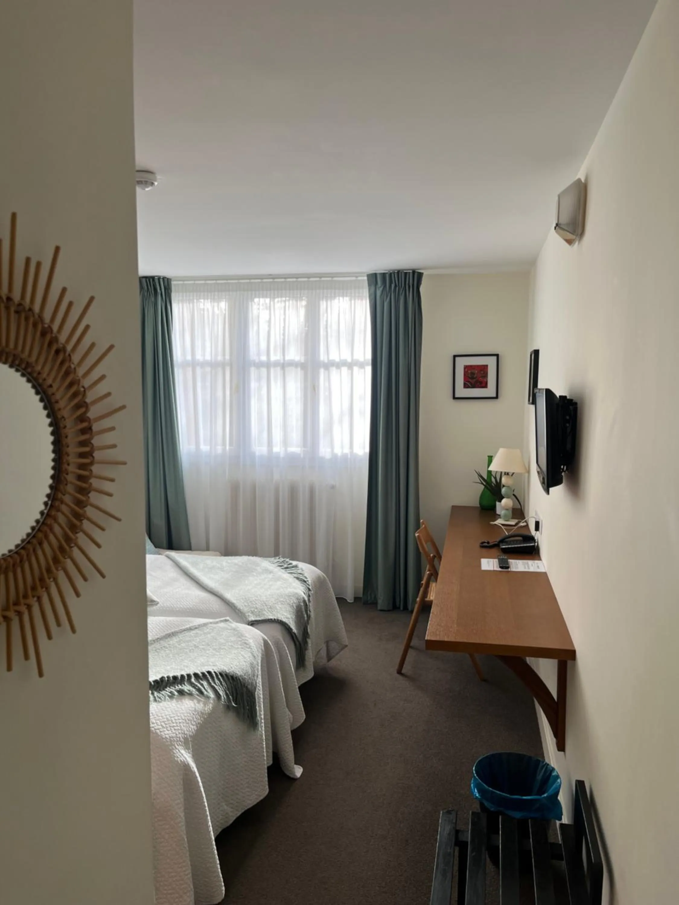 Bed in Le Téméraire Hôtel