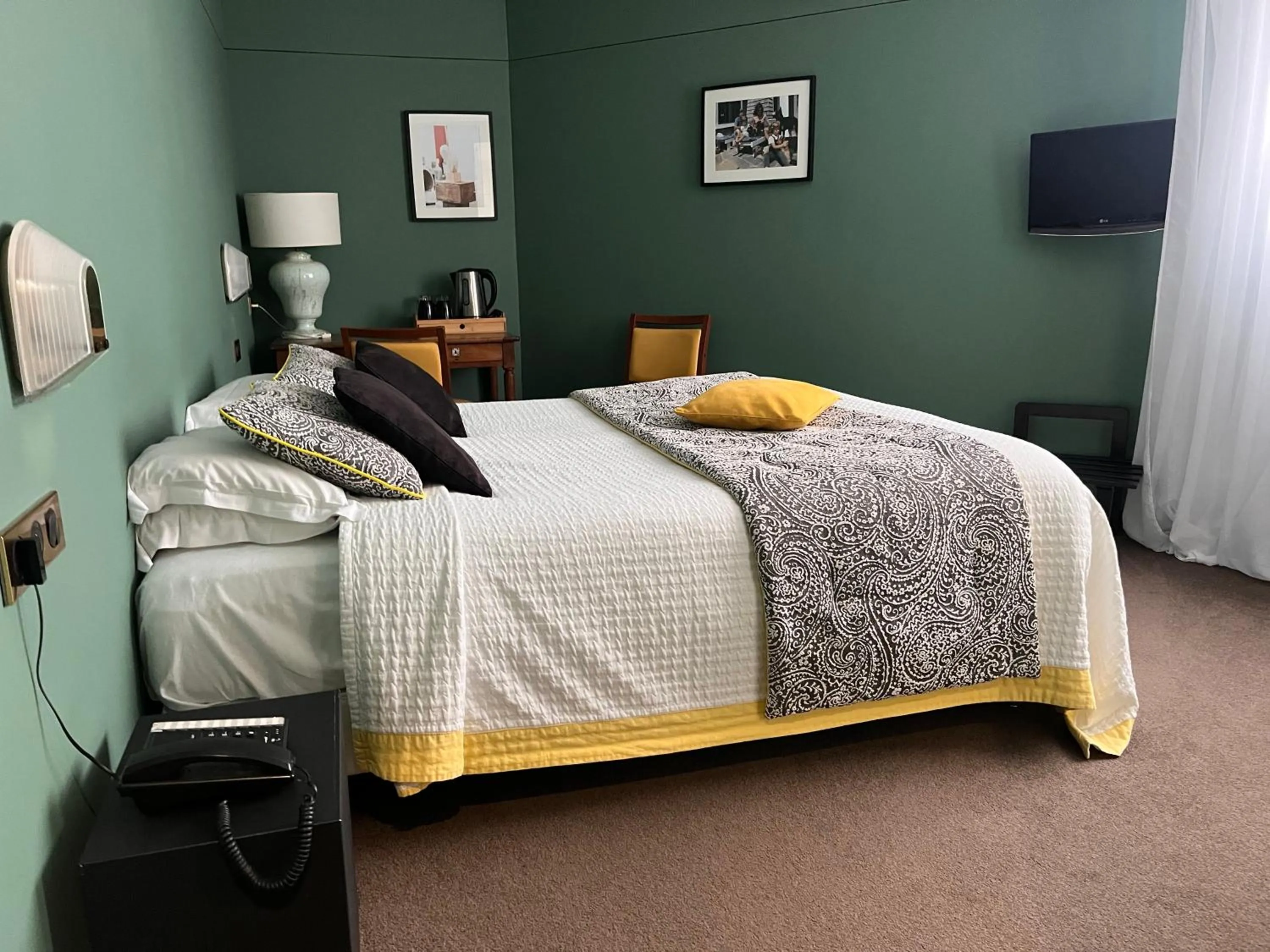 Bed in Le Téméraire Hôtel