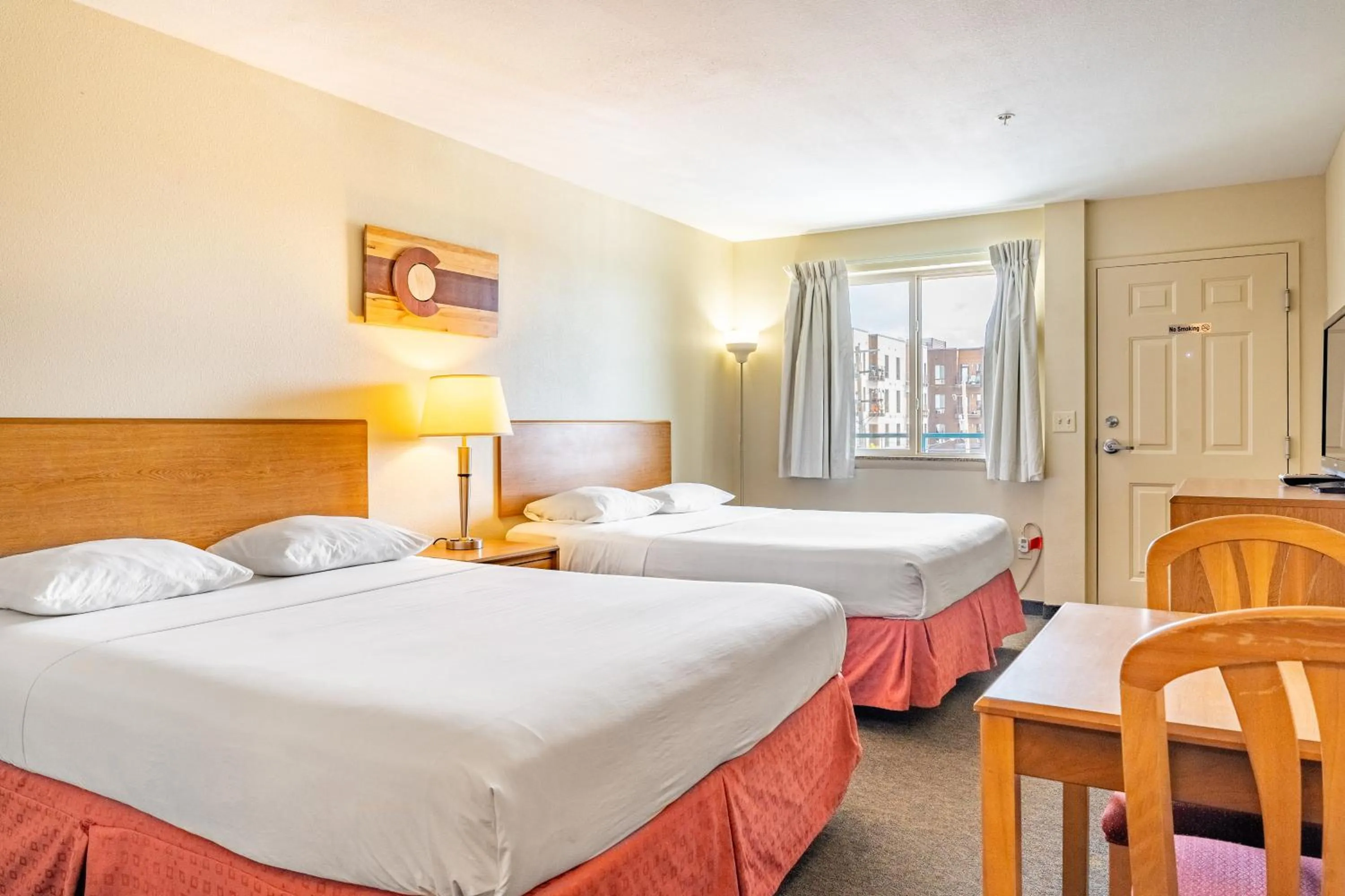 Photo of the whole room, Bed in City Inn