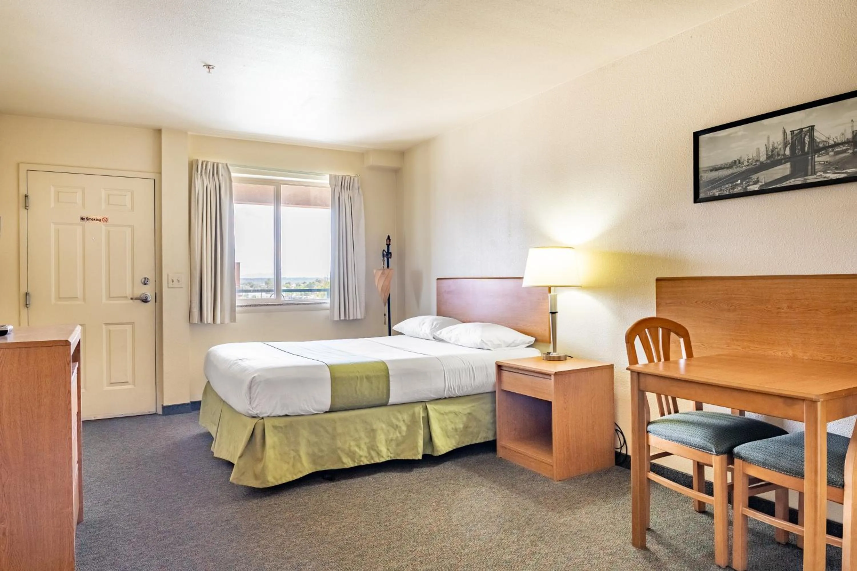 Photo of the whole room, Bed in City Inn