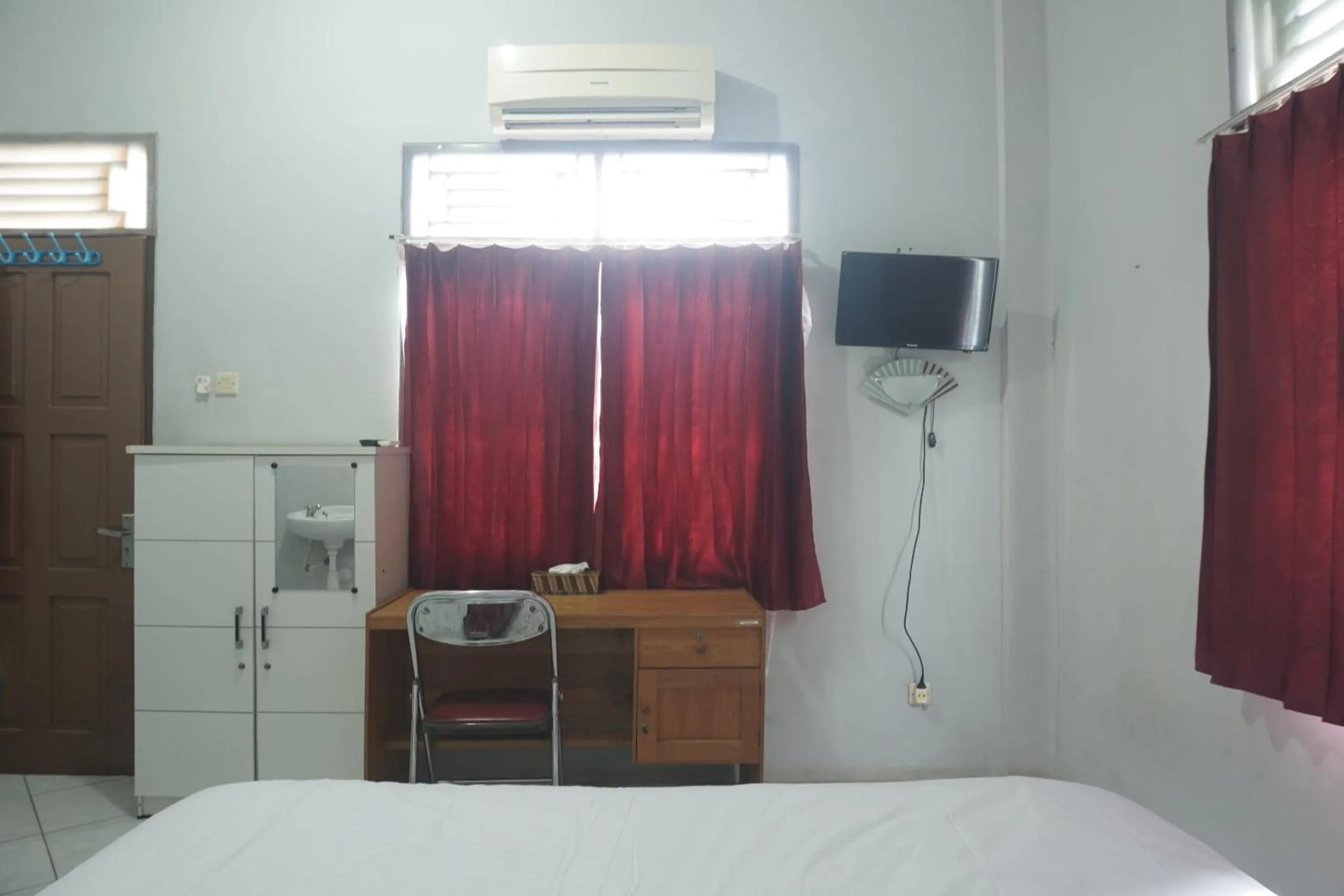Bedroom in Hotel O Guest House Zidan 21