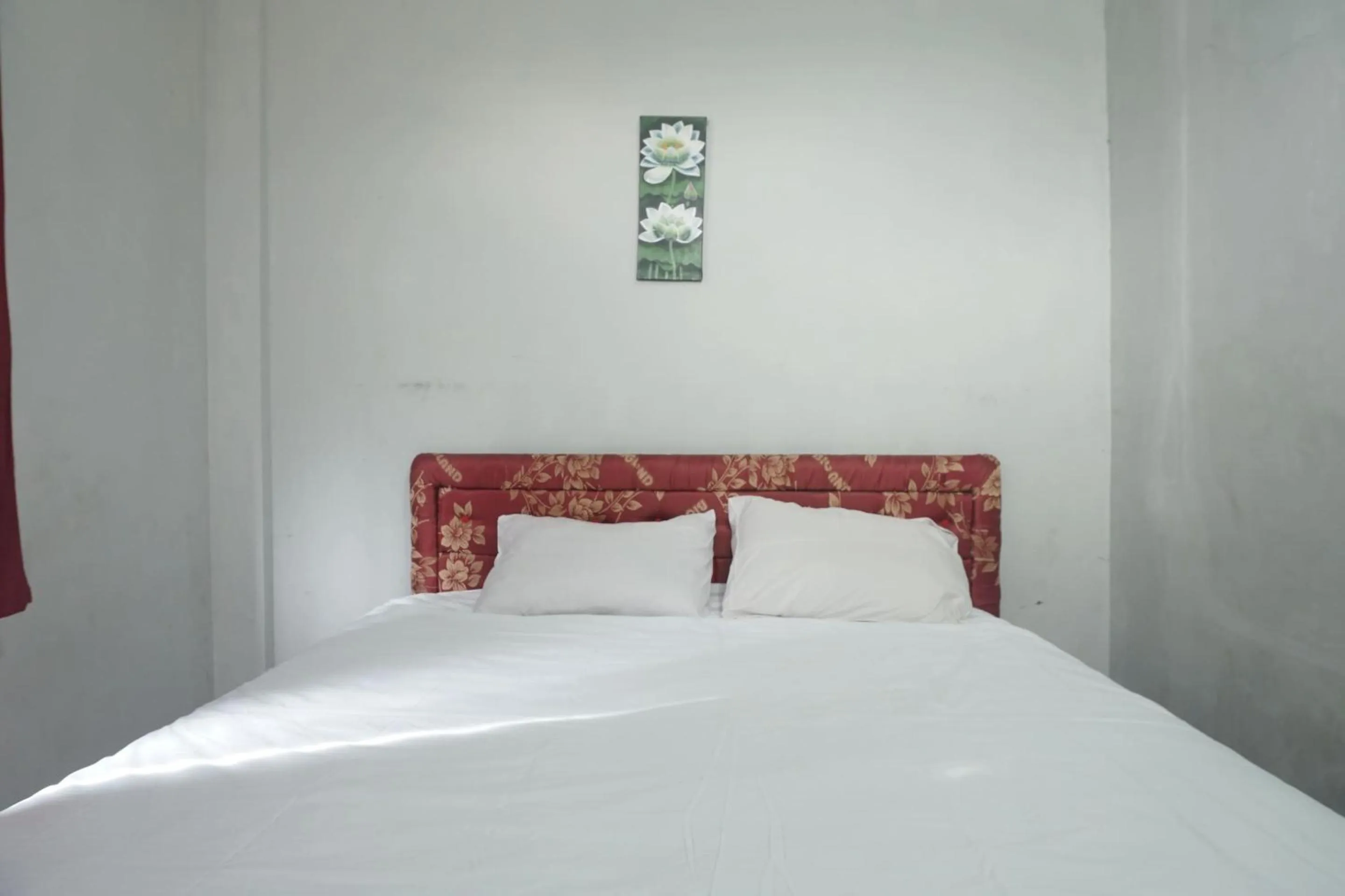 Bedroom in Hotel O Guest House Zidan 21