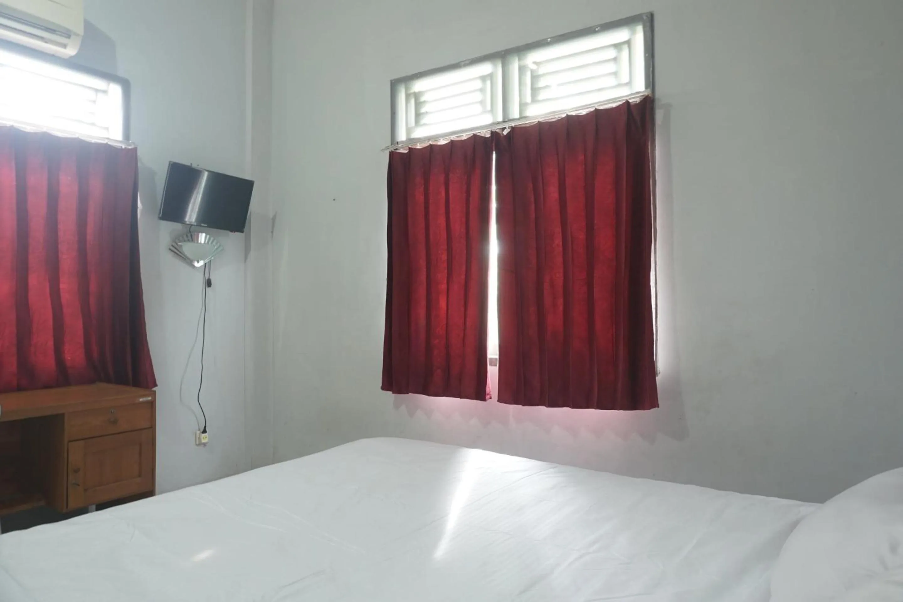 Bedroom in Hotel O Guest House Zidan 21