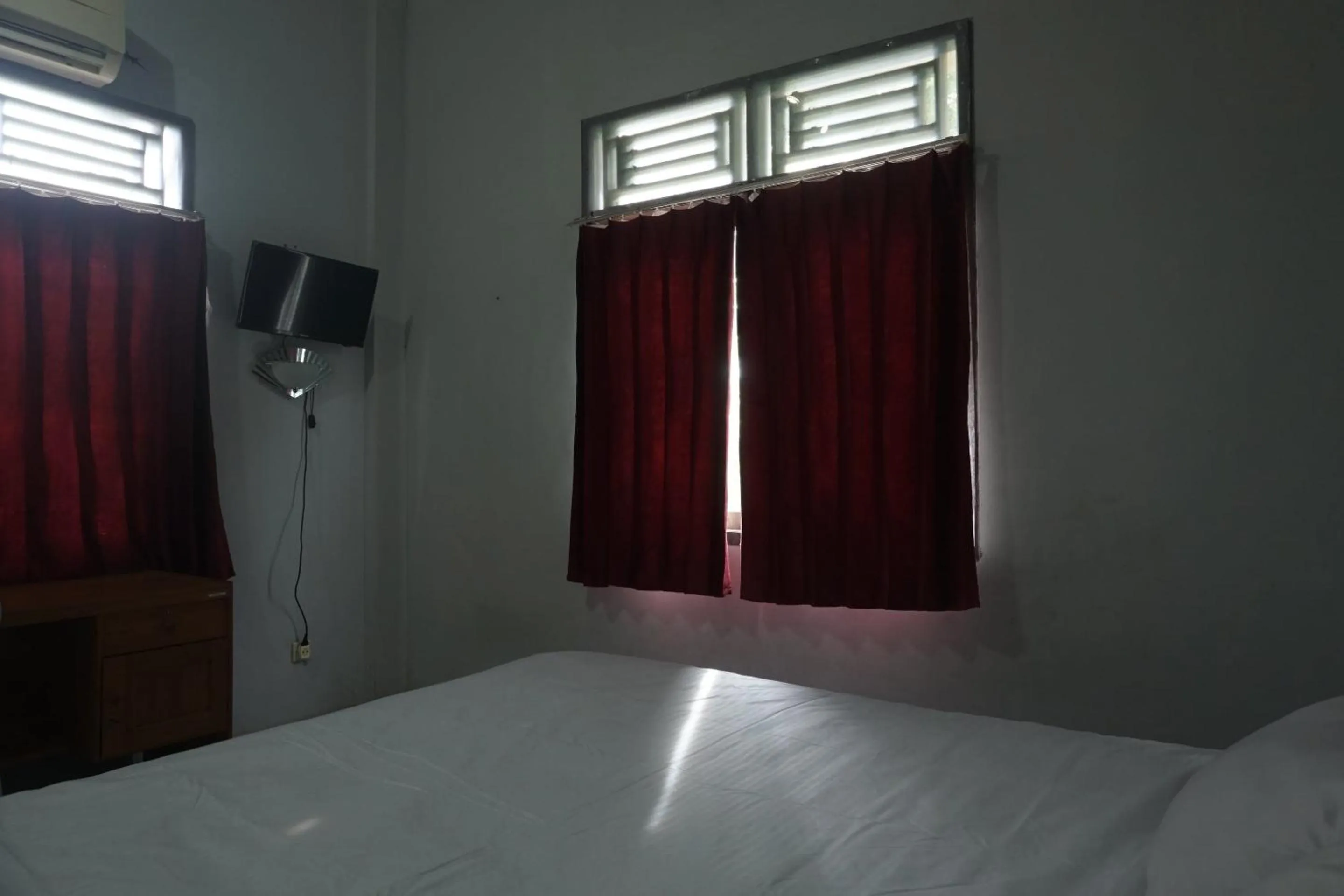 Bedroom in Hotel O Guest House Zidan 21