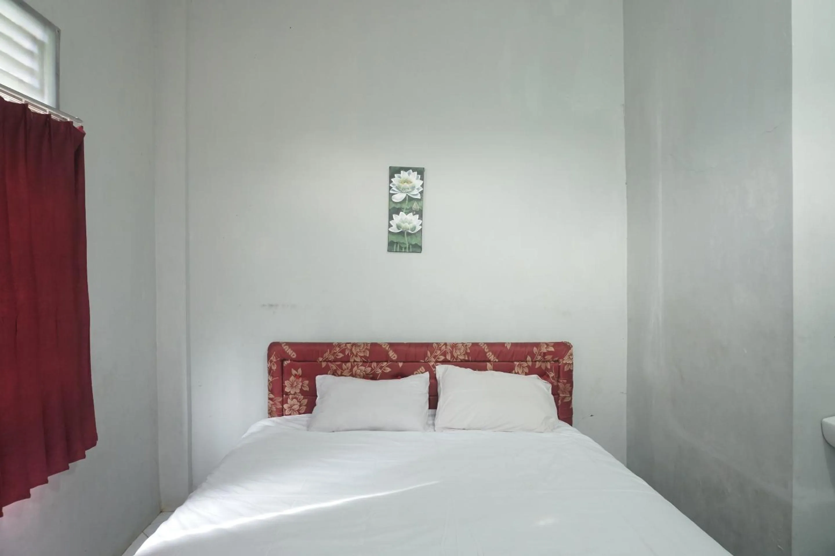 Bedroom in Hotel O Guest House Zidan 21