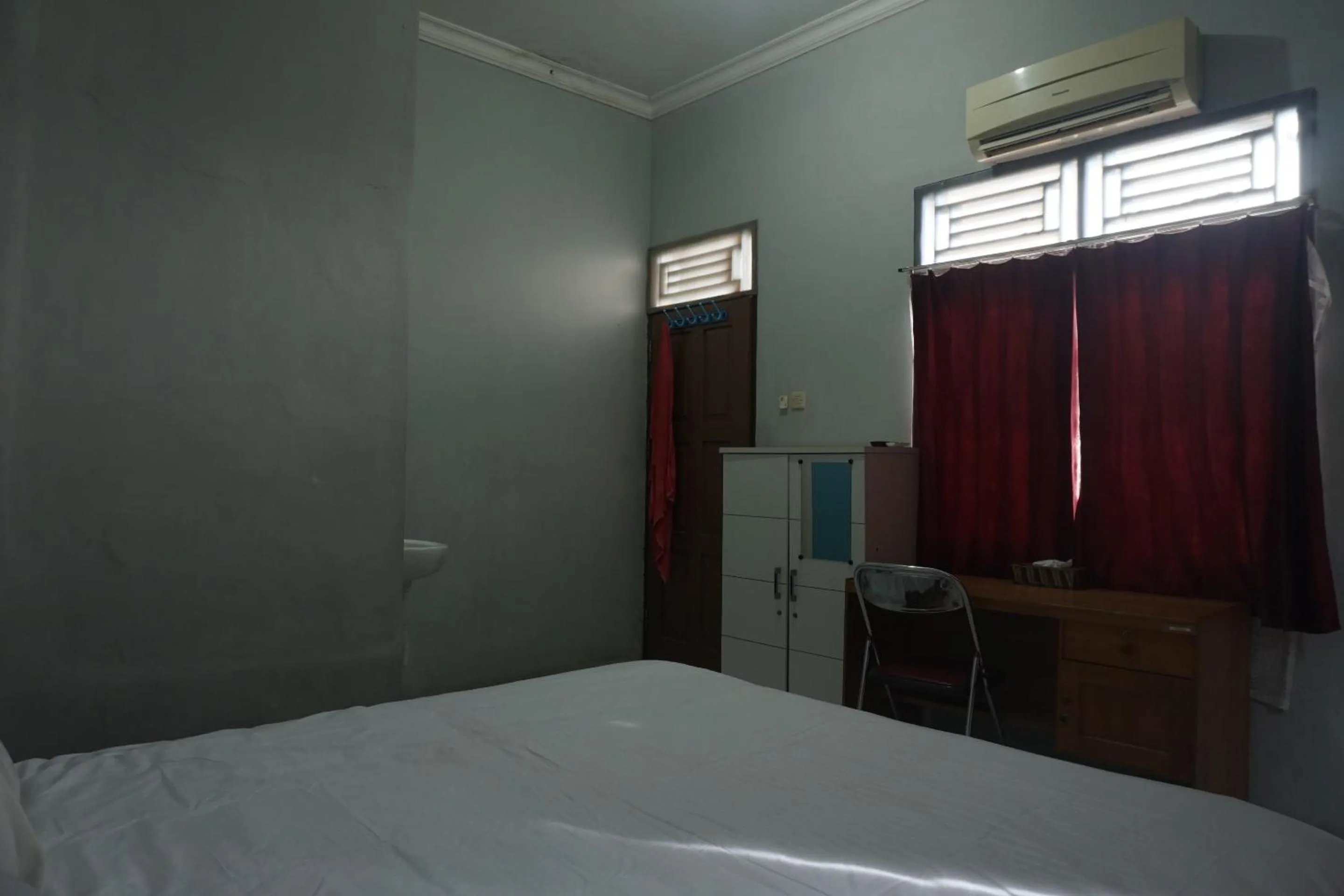 Bedroom in Hotel O Guest House Zidan 21