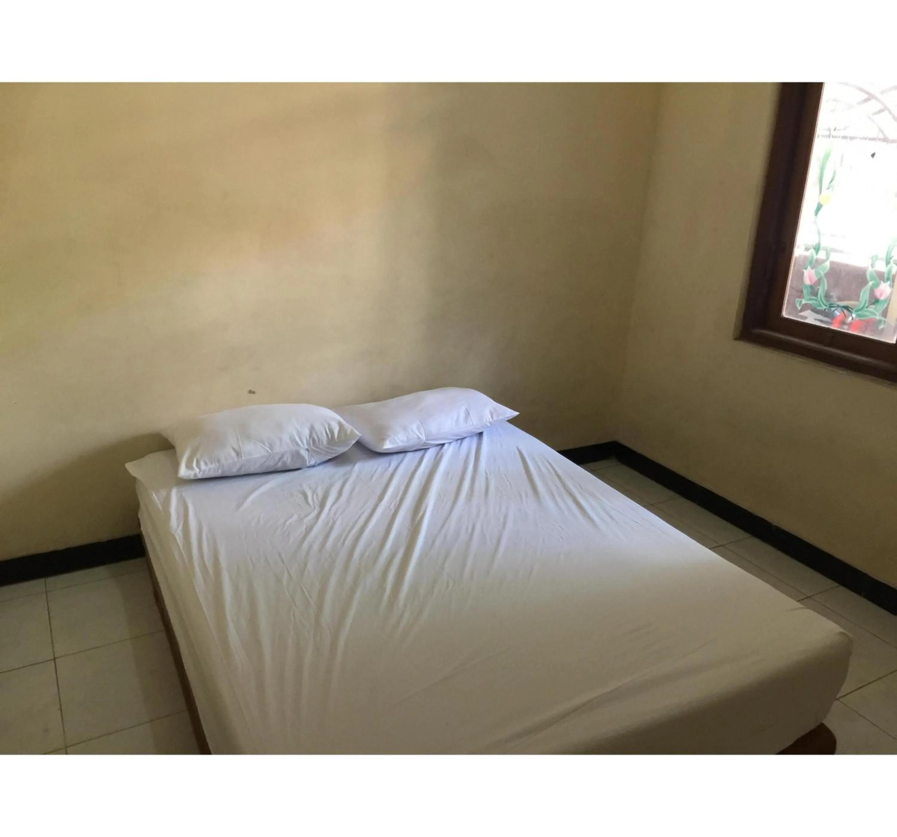 Bedroom, Bed in Hotel O Homestay Puri Indah SyariahNearBandara Internasional Juanda