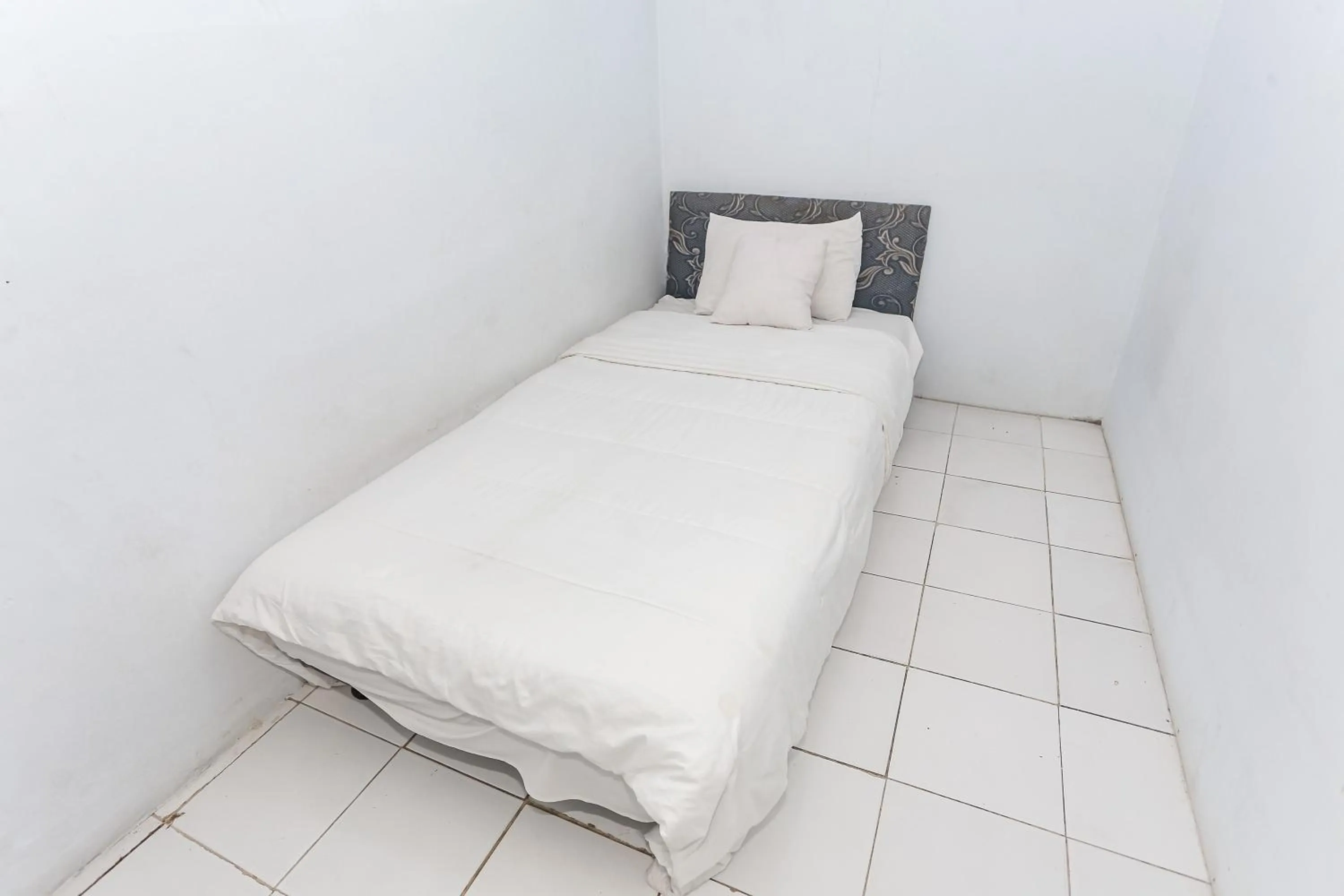 Bedroom in SPOT ON 93515 Pulo Gebang Guest House