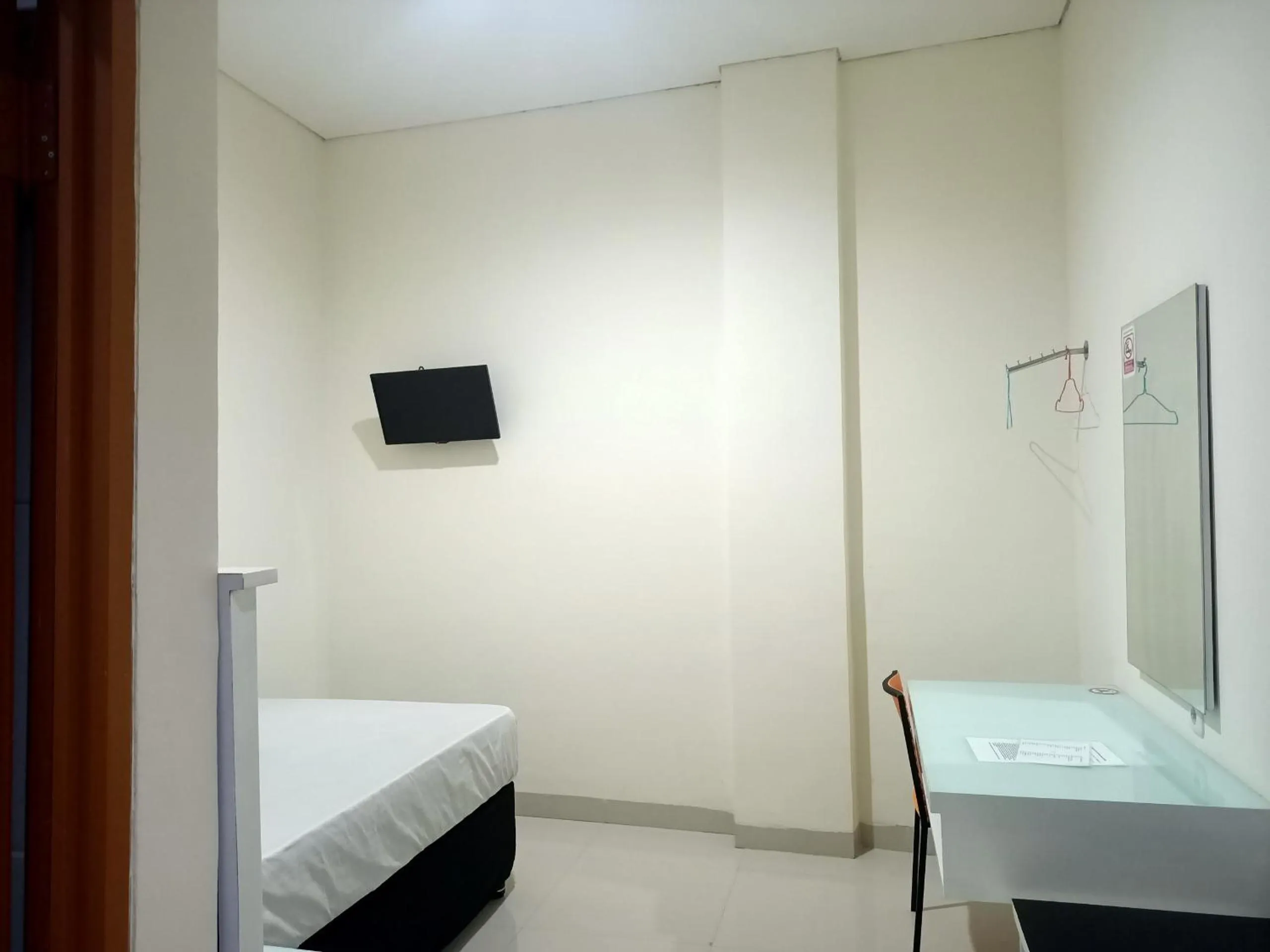 Bedroom in Hotel O Millow Kost Near Gedung Rektorat IAIN PAREPARE