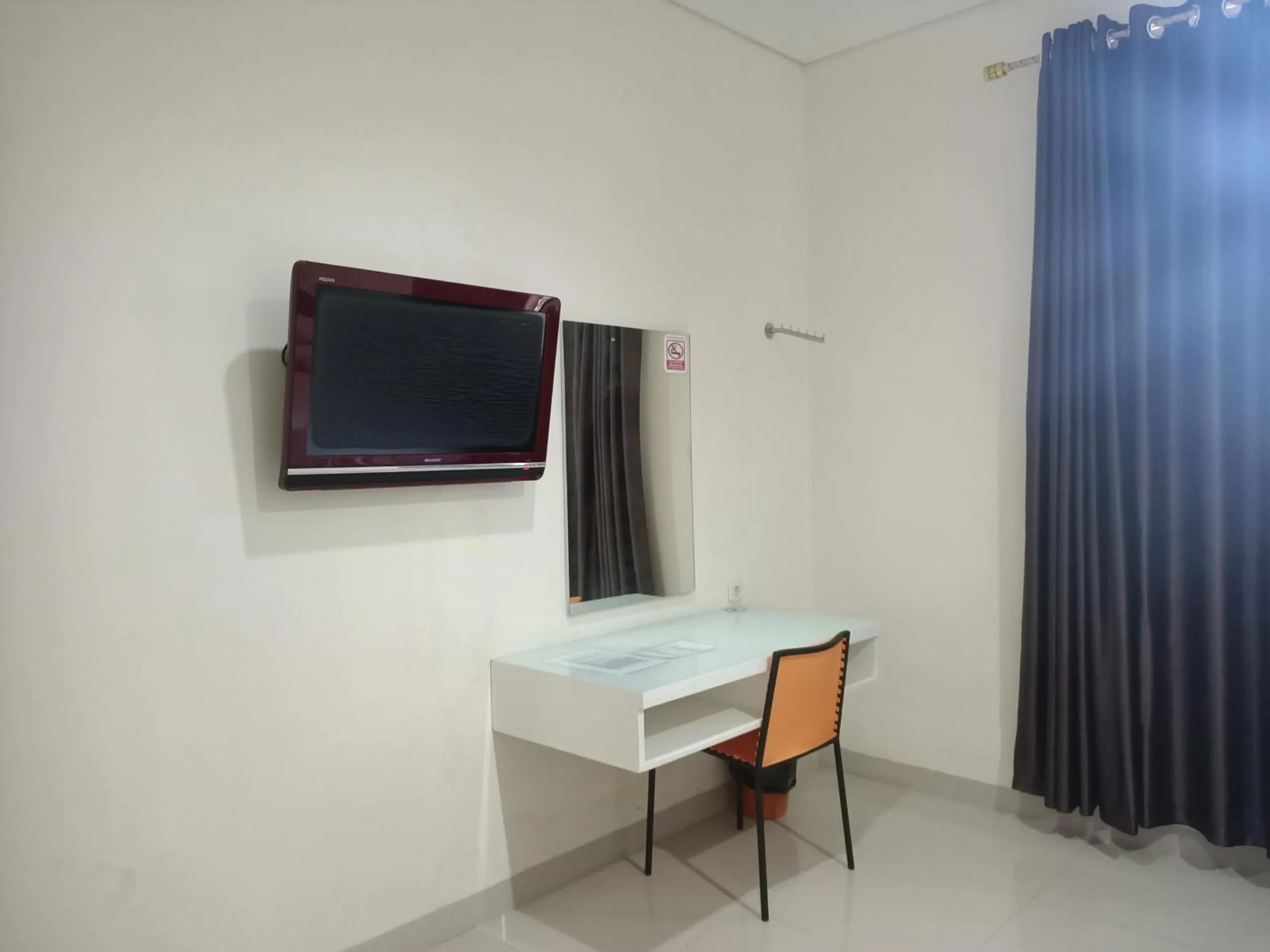 Bedroom in Hotel O Millow Kost Near Gedung Rektorat IAIN PAREPARE