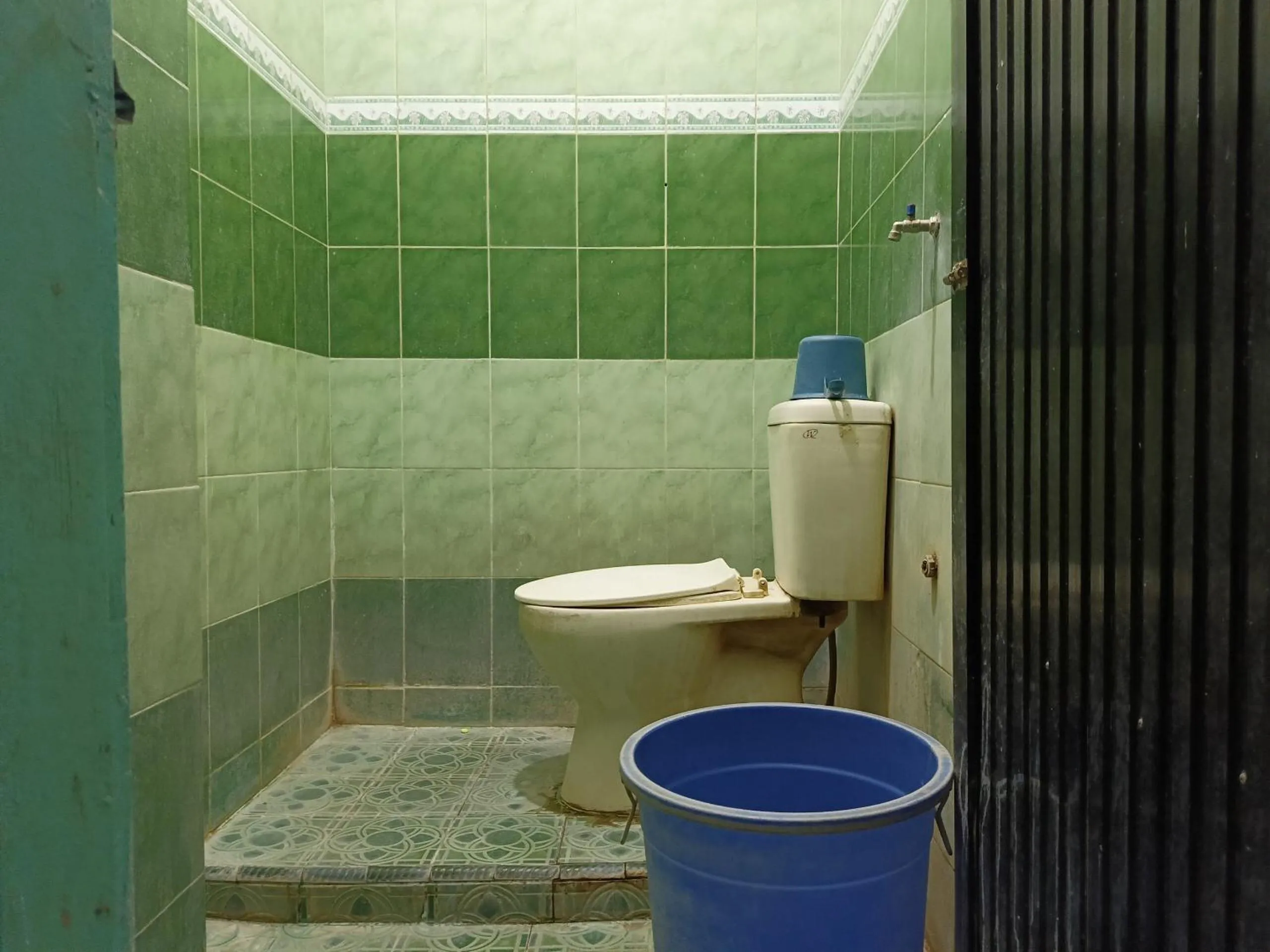 Bathroom in Hotel O Millow Kost Near Gedung Rektorat IAIN PAREPARE