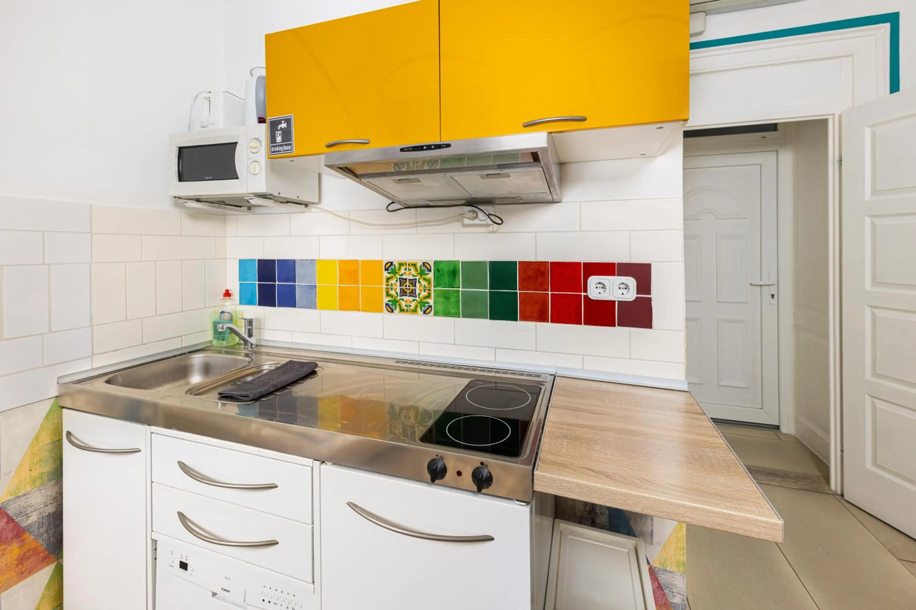 kitchen in Amber Gardenview Studios Downtown