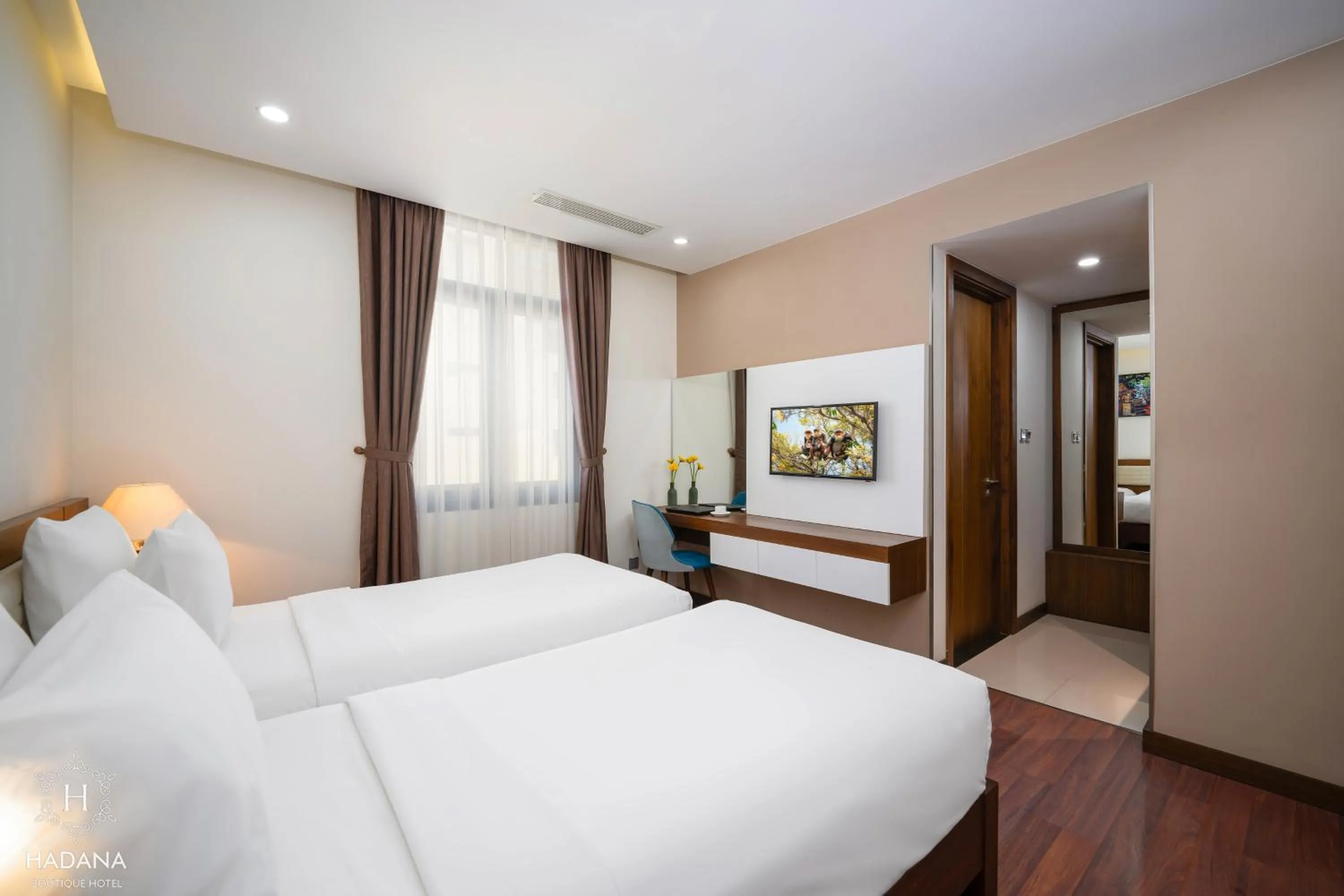 Bed in Hadana Boutique Hotel Danang