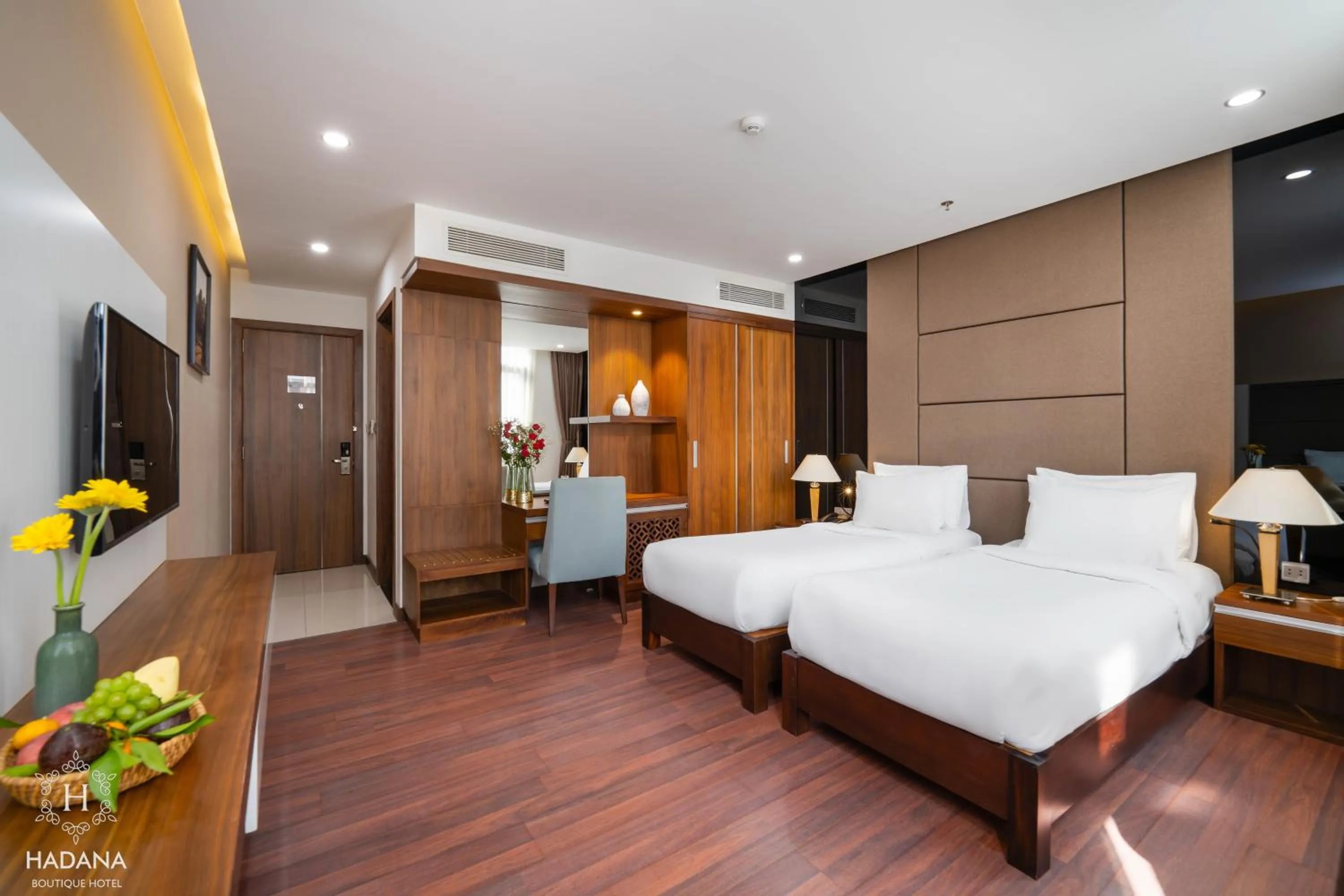 Communal lounge/ TV room, Bed in Hadana Boutique Hotel Danang