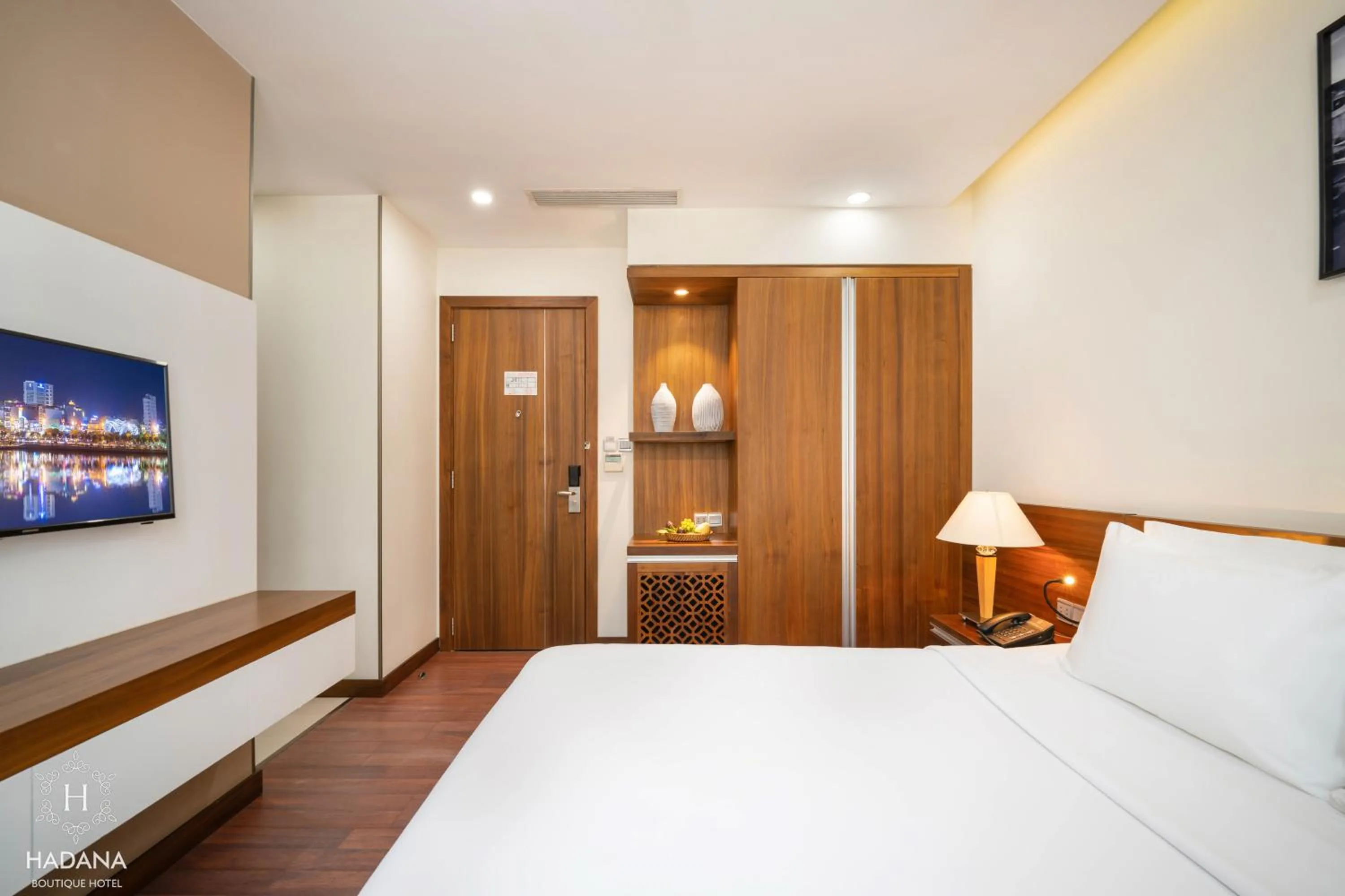 Bed in Hadana Boutique Hotel Danang